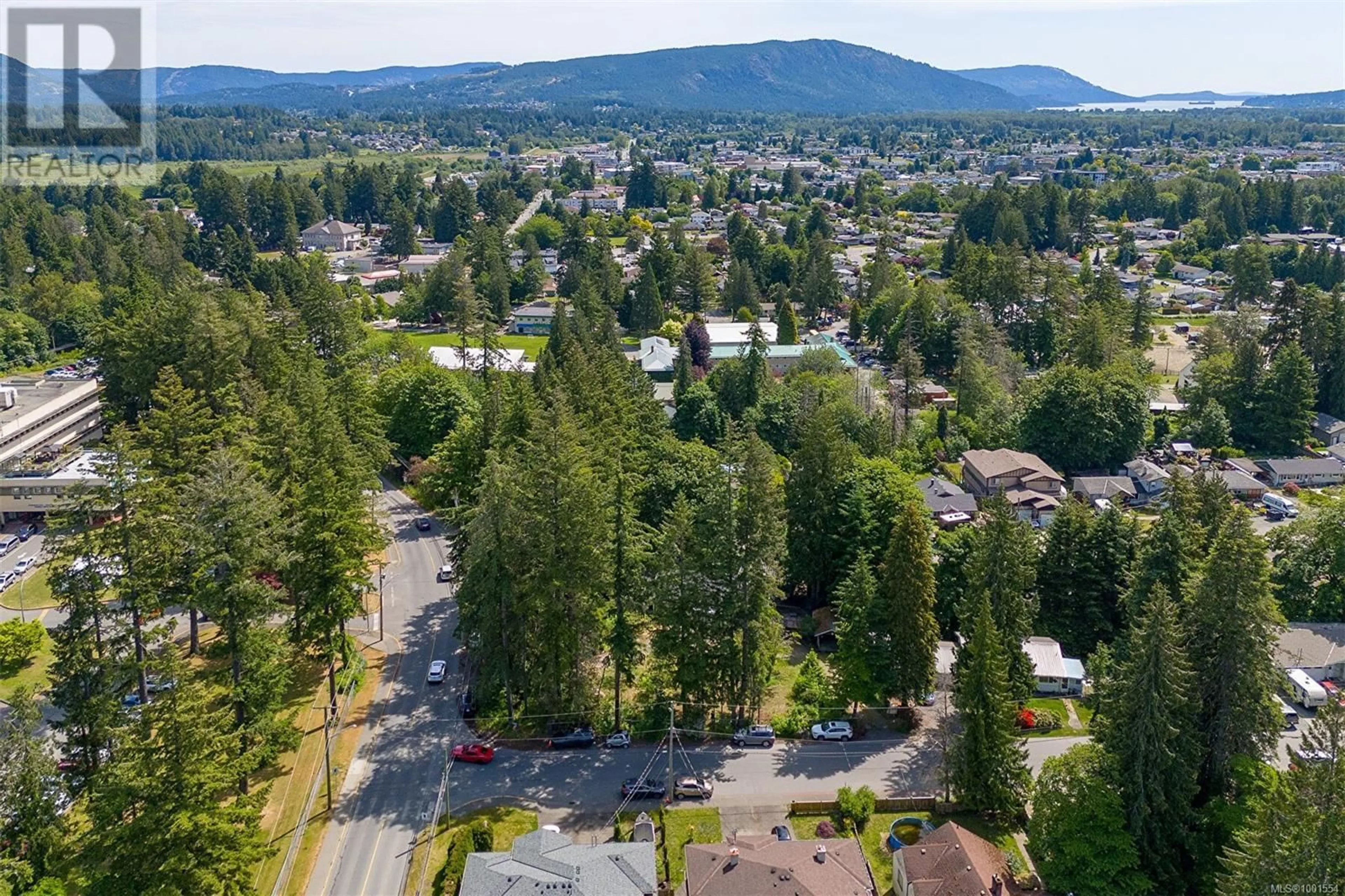 A pic from outside/outdoor area/front of a property/back of a property/a pic from drone, mountain view for 3056 GIBBINS ROAD, Duncan British Columbia V9L1E4