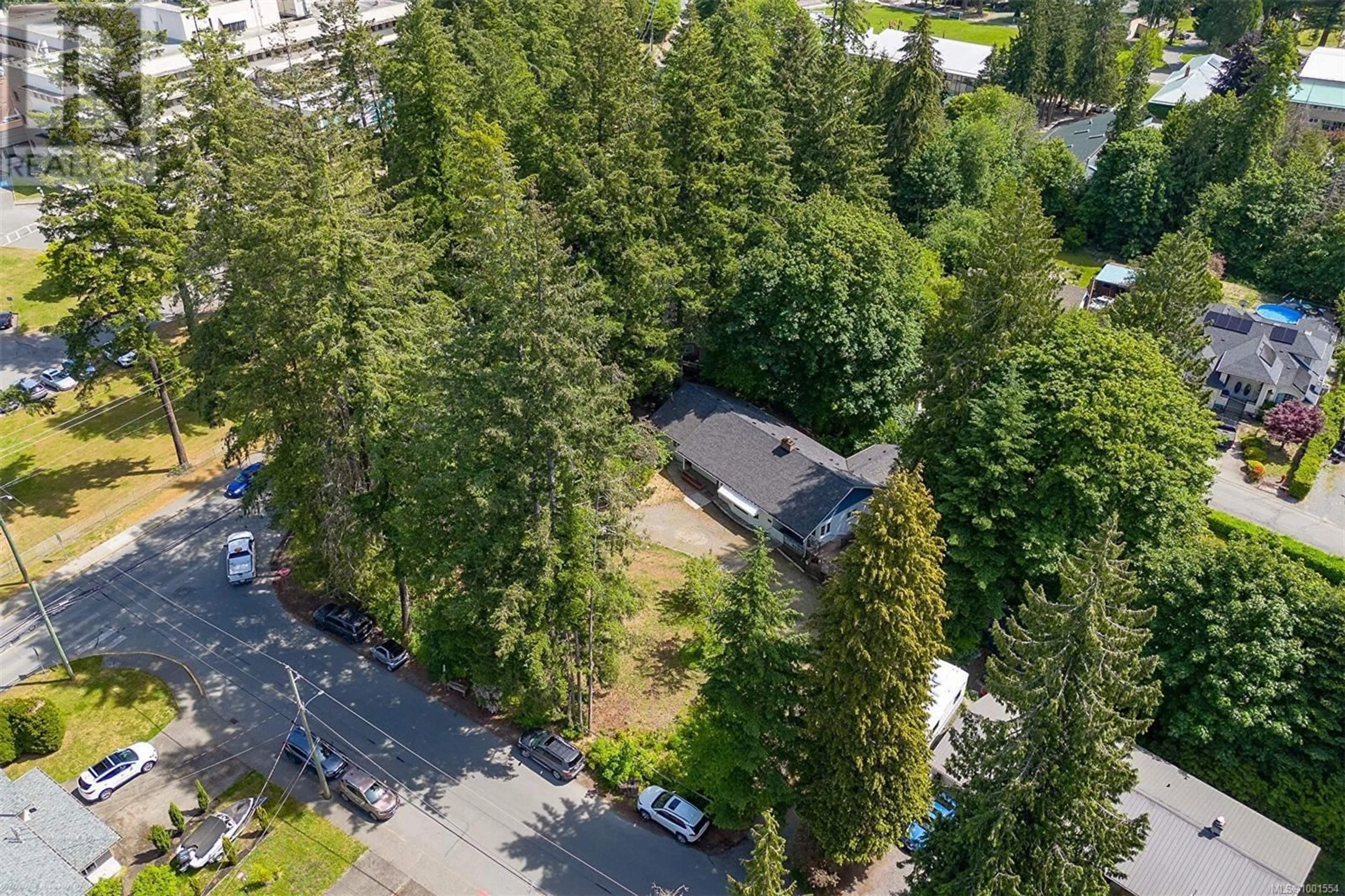 A pic from outside/outdoor area/front of a property/back of a property/a pic from drone, forest/trees view for 3056 GIBBINS ROAD, Duncan British Columbia V9L1E4