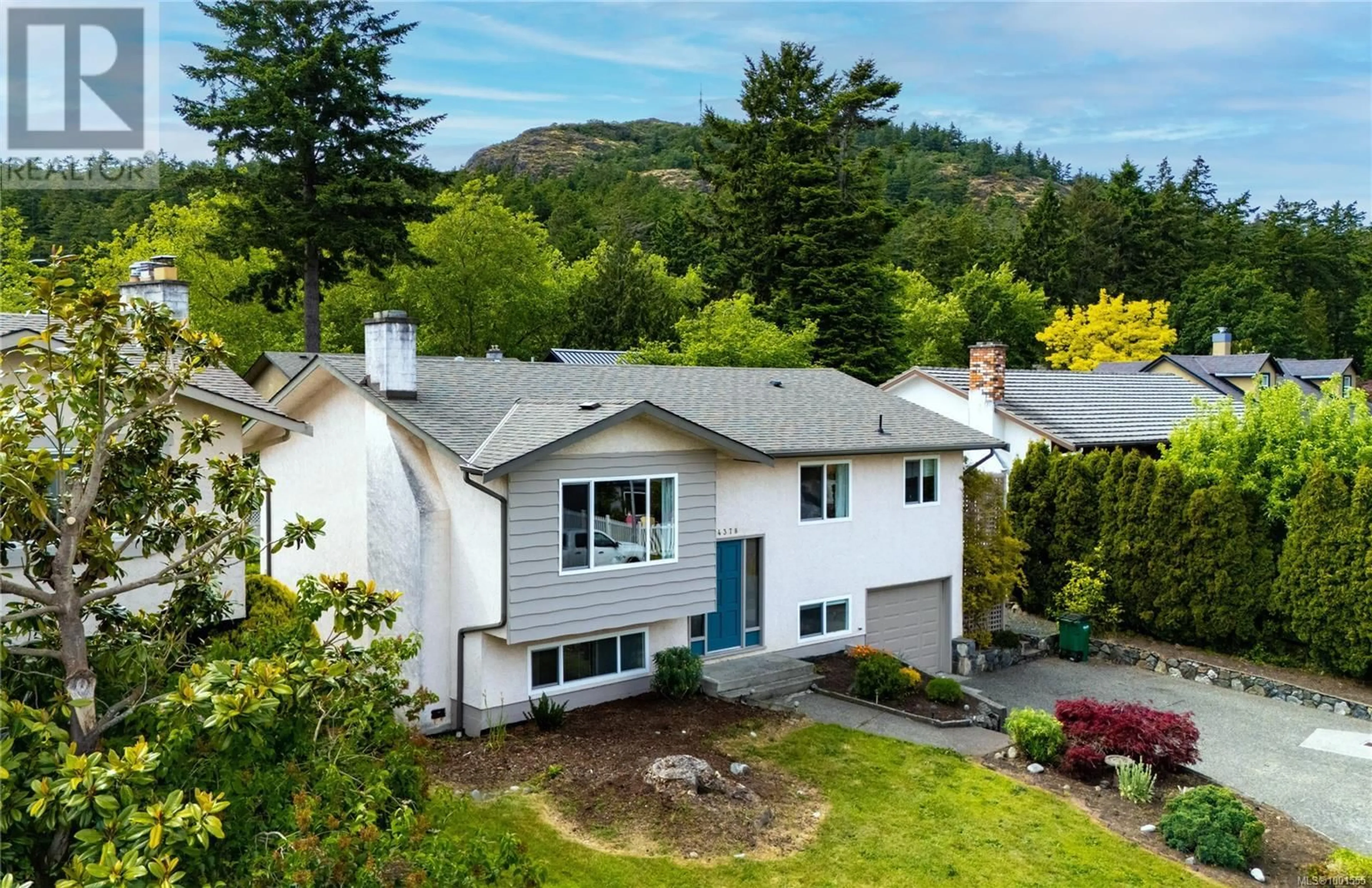 A pic from outside/outdoor area/front of a property/back of a property/a pic from drone, mountain view for 4378 FIELDMONT PLACE, Saanich British Columbia V8N4Z3