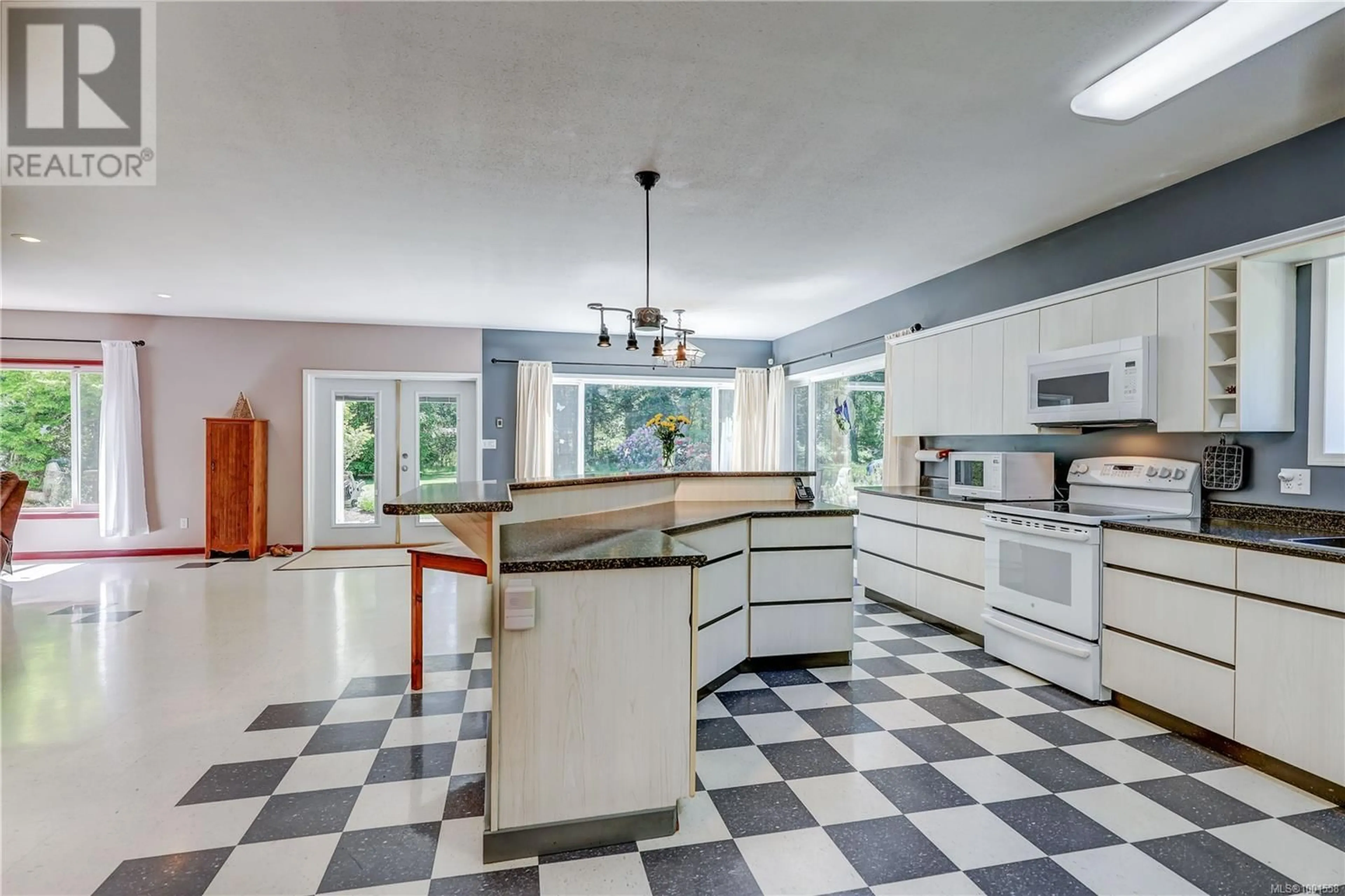 Open concept kitchen, ceramic/tile floor for 260 BATES DRIVE, Fanny Bay British Columbia V0R1W0
