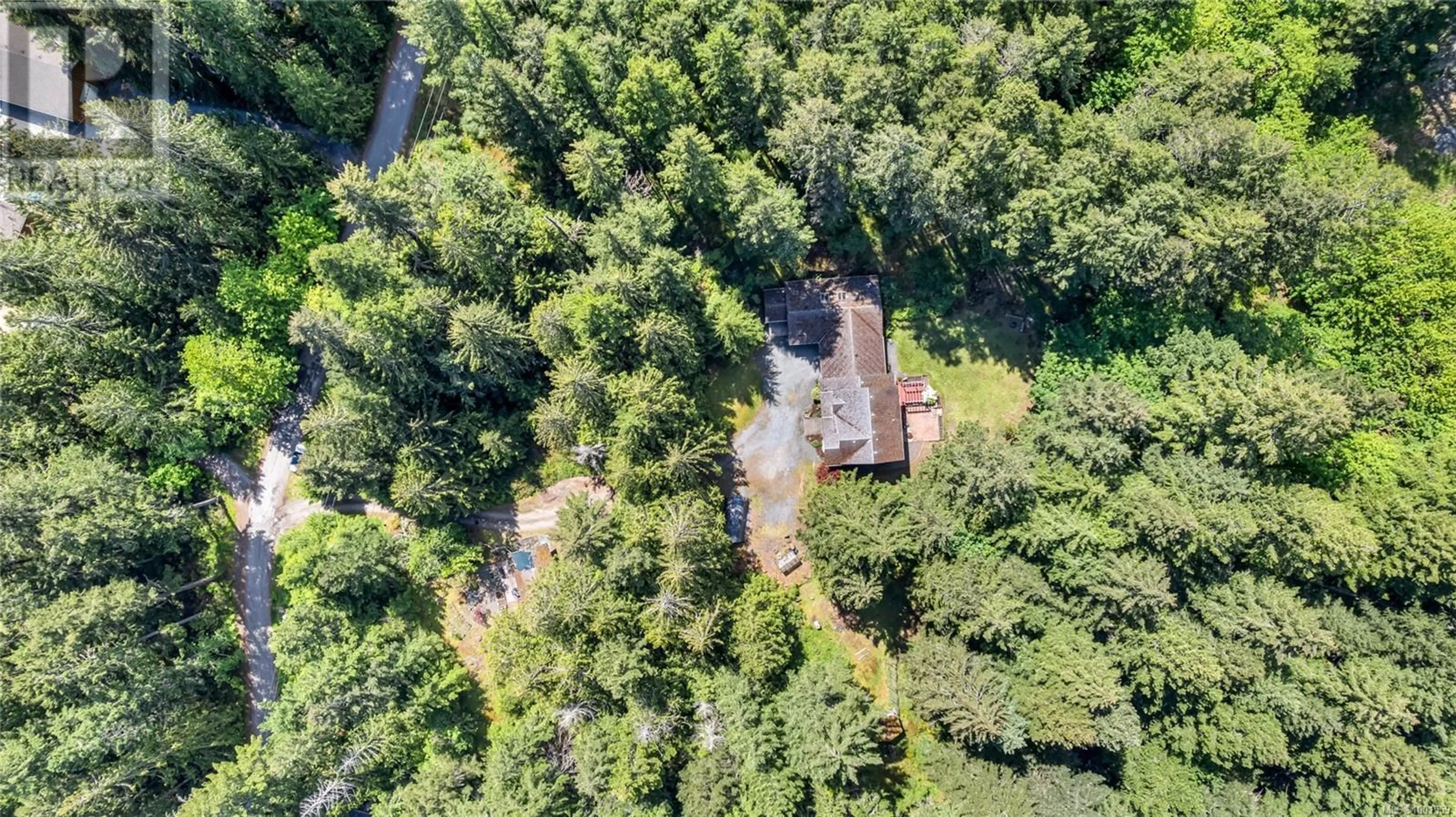 A pic from outside/outdoor area/front of a property/back of a property/a pic from drone, forest/trees view for 1850 LAKEWOOD ROAD, Shawnigan Lake British Columbia V0R2W0