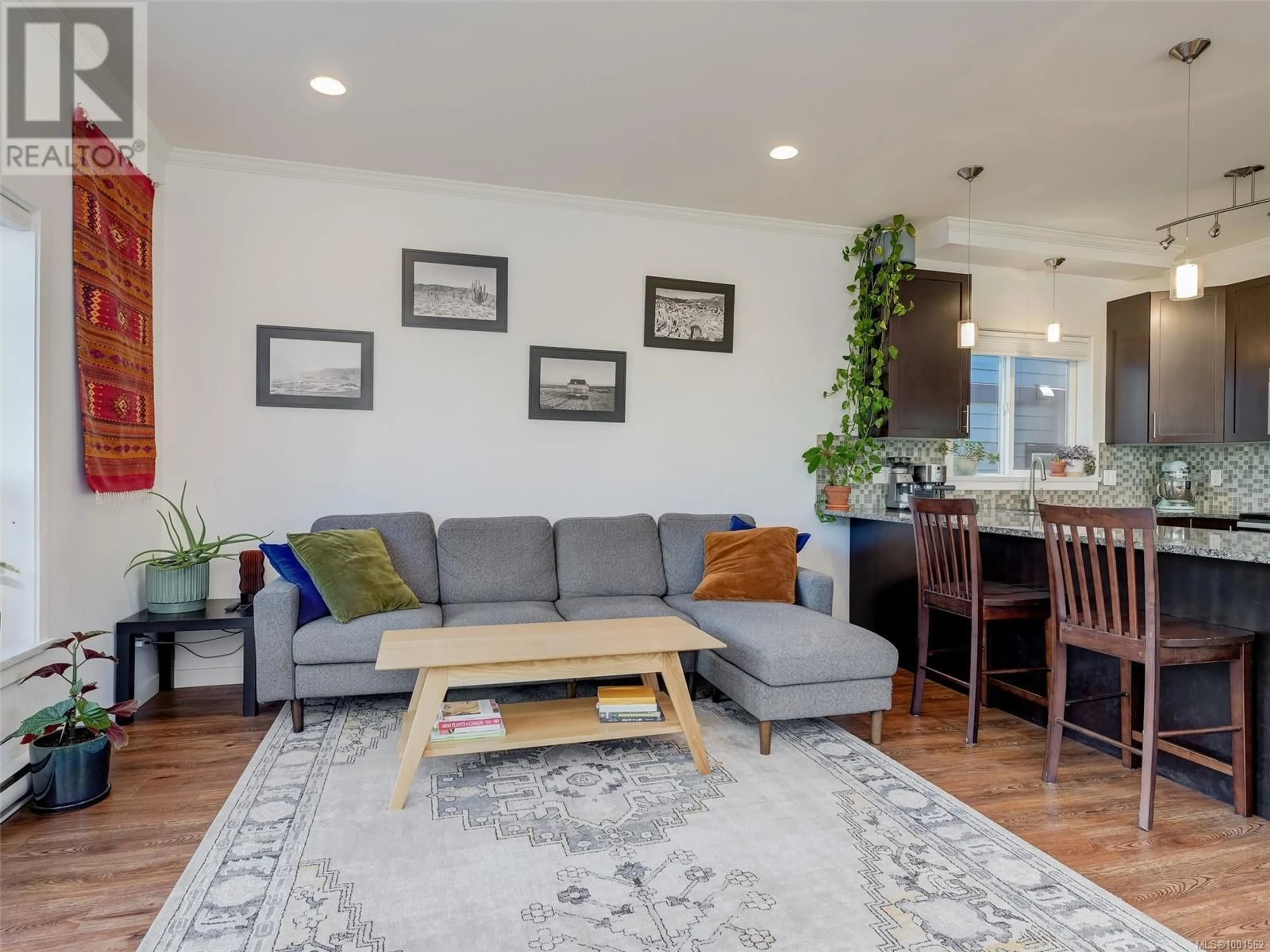Living room with furniture, wood/laminate floor for 2976 TRESTLE PLACE, Langford British Columbia V9B0K6