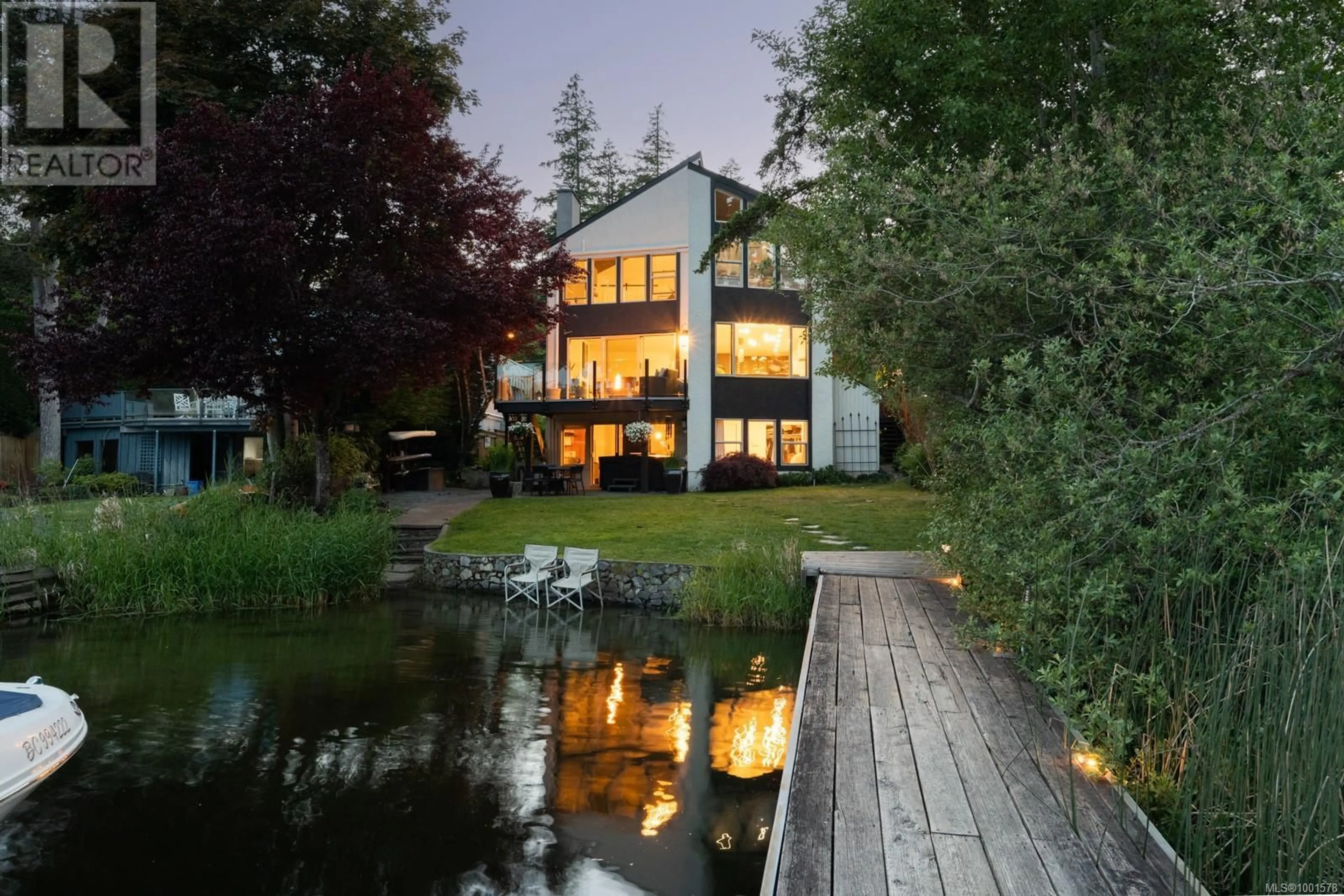 A pic from outside/outdoor area/front of a property/back of a property/a pic from drone, water/lake/river/ocean view for 5045 PROSPECT LAKE ROAD, Saanich British Columbia V9E1J5