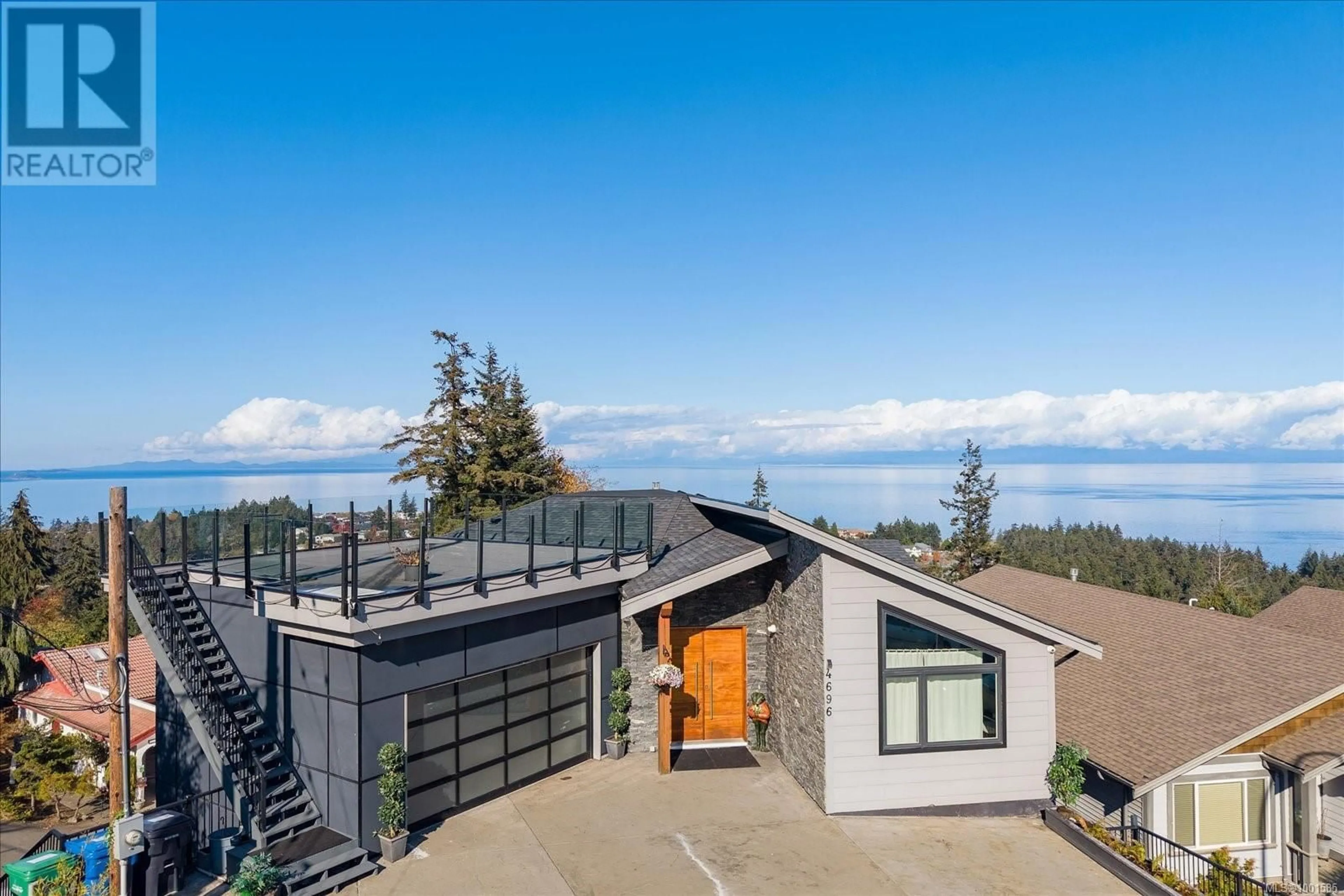 A pic from outside/outdoor area/front of a property/back of a property/a pic from drone, water/lake/river/ocean view for 4696 LAGUNA WAY, Nanaimo British Columbia V9T0A7