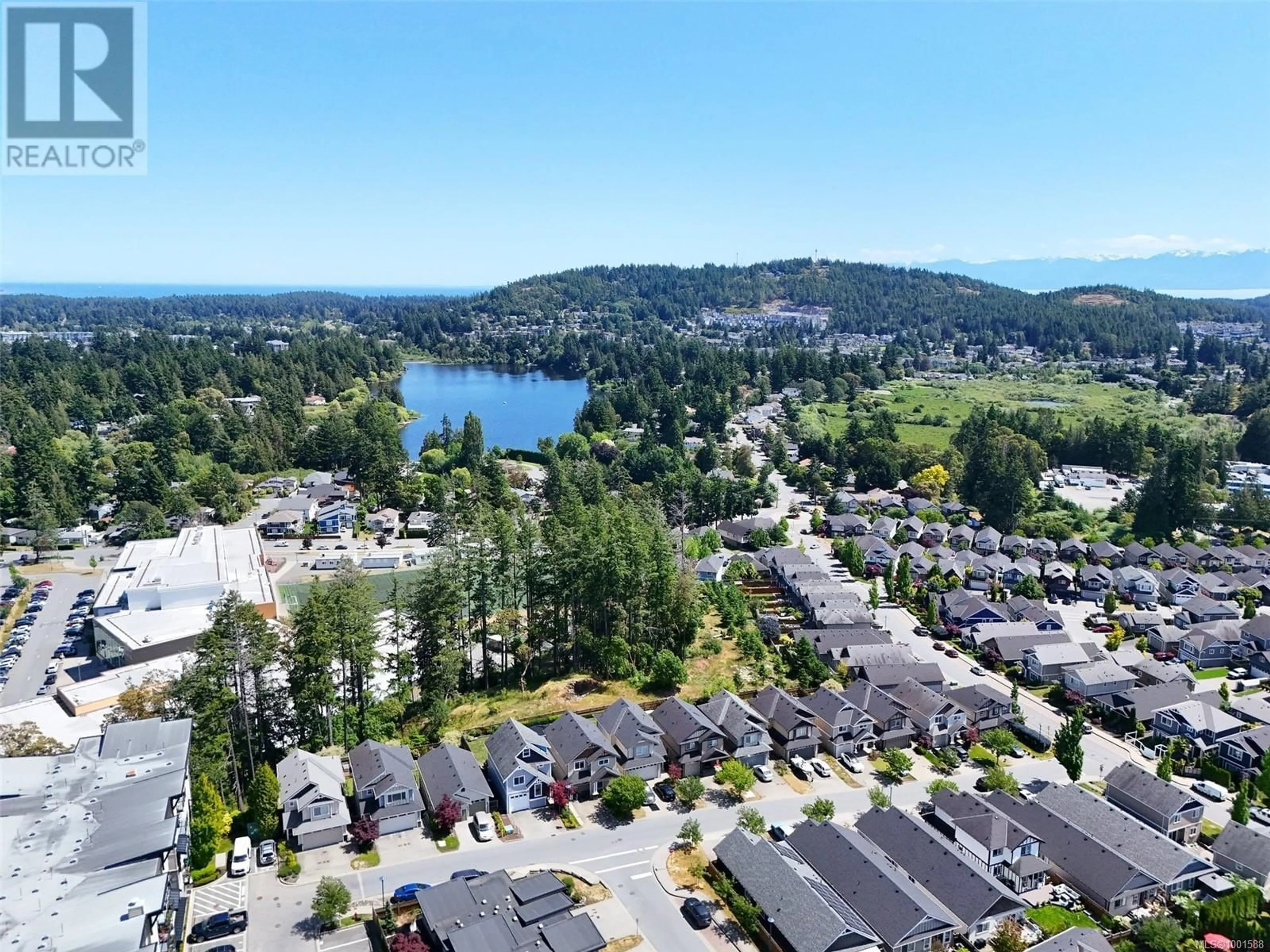 A pic from outside/outdoor area/front of a property/back of a property/a pic from drone, water/lake/river/ocean view for 1161 SIKORSKY ROAD, Langford British Columbia V9B4B4