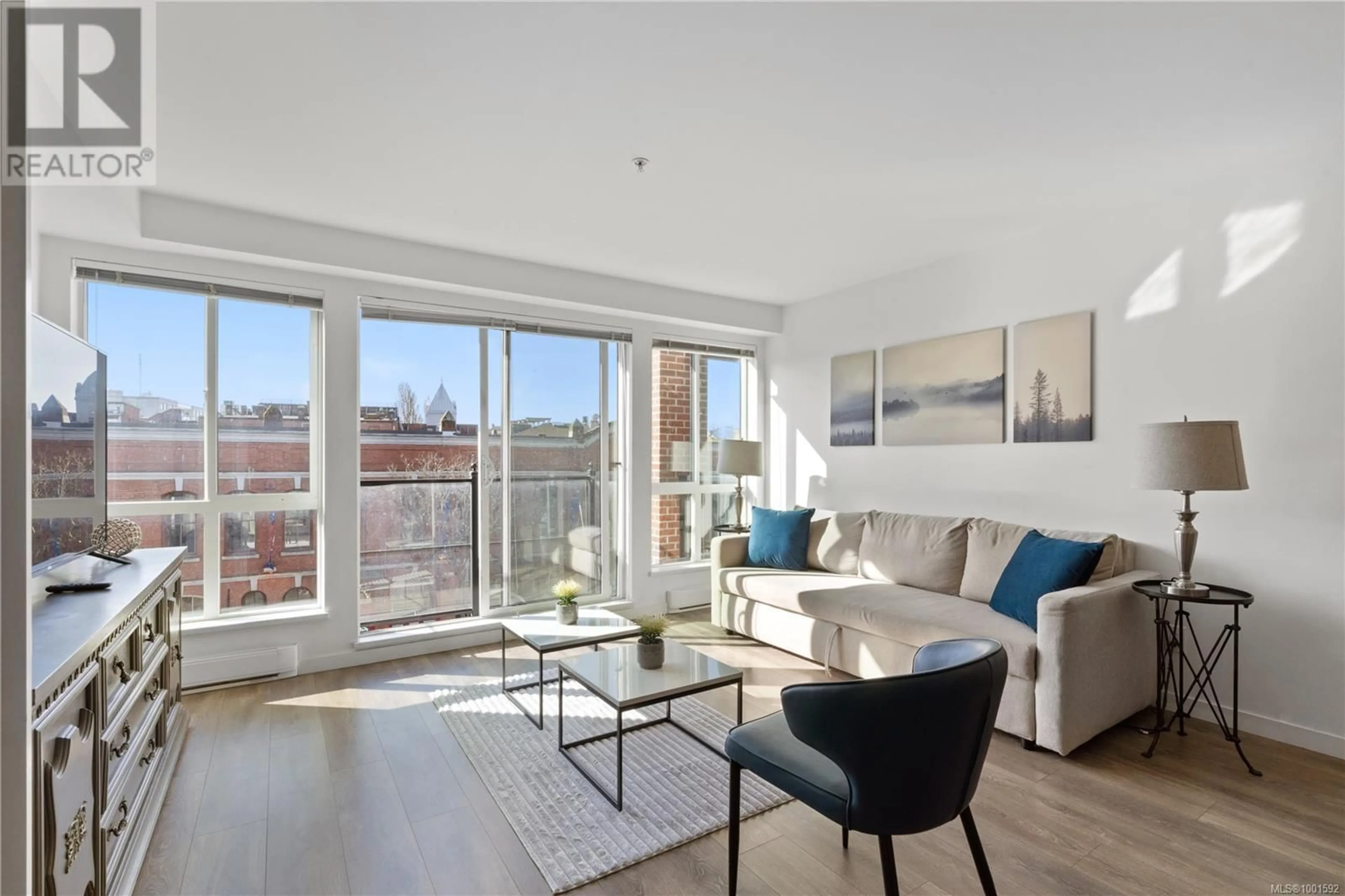 Living room with furniture, unknown for 312 - 528 PANDORA AVENUE, Victoria British Columbia V8W0C6