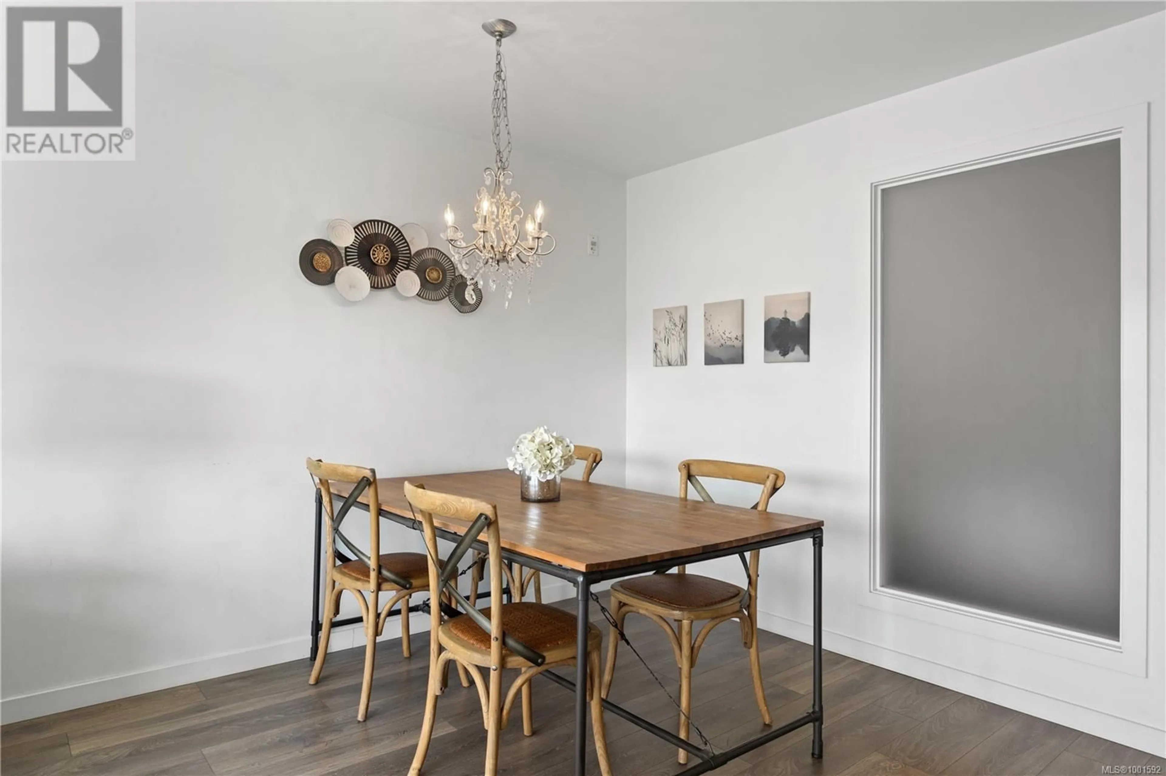 Dining room, wood/laminate floor for 312 - 528 PANDORA AVENUE, Victoria British Columbia V8W0C6