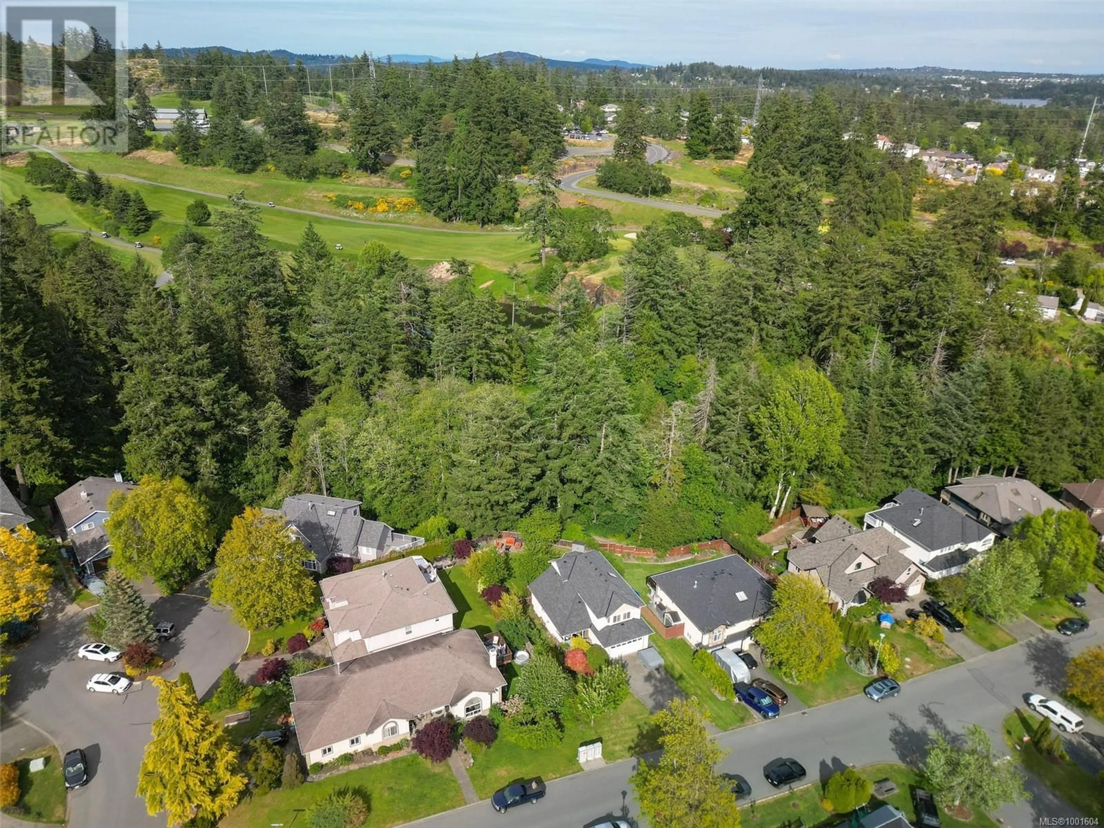 A pic from outside/outdoor area/front of a property/back of a property/a pic from drone, forest/trees view for 2287 MEADOW VALE DRIVE, View Royal British Columbia V9B6J2
