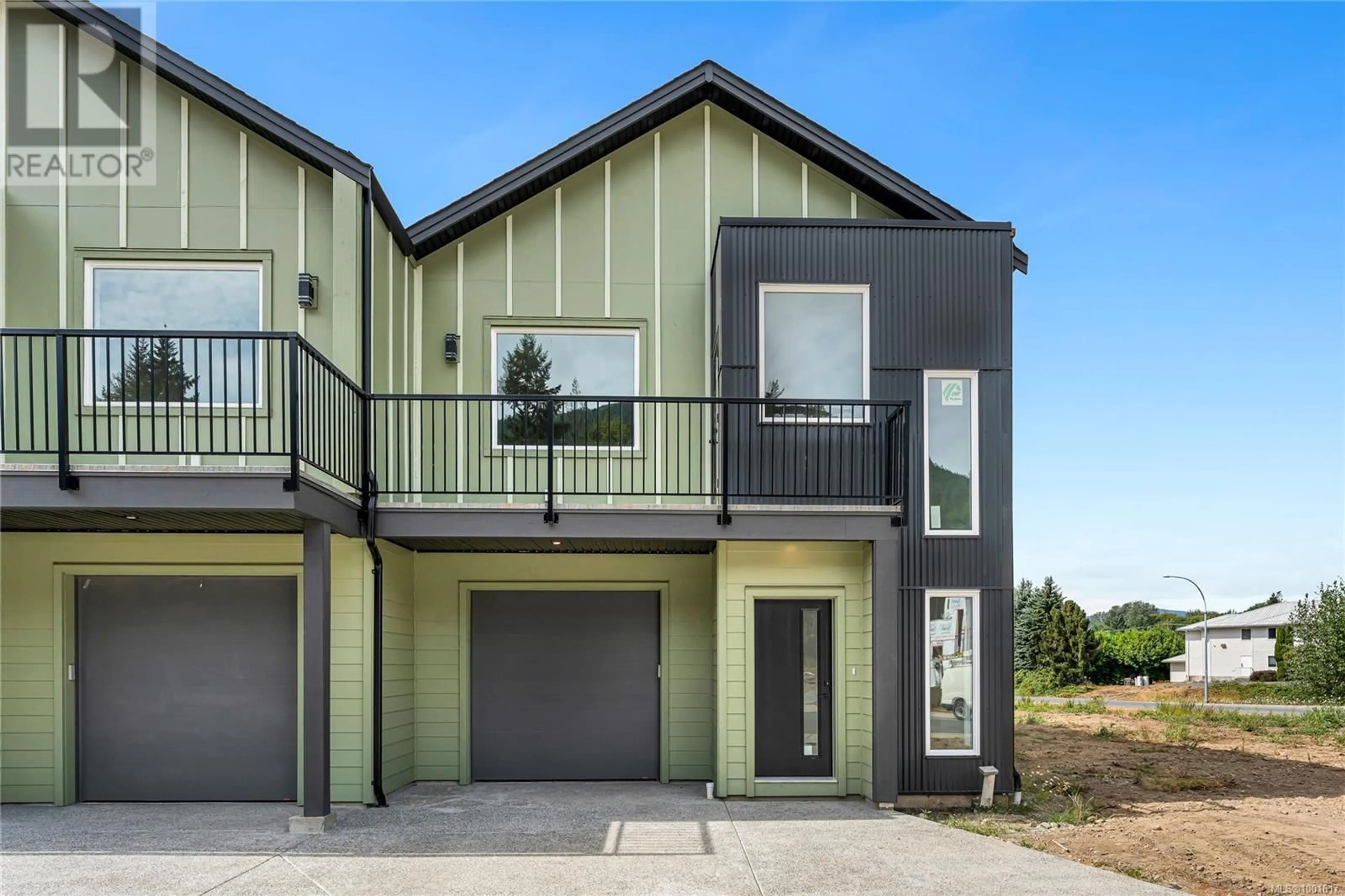 Home with vinyl exterior material, street for A - 122 PLANTE CRESCENT, Lake Cowichan British Columbia V0R2G0