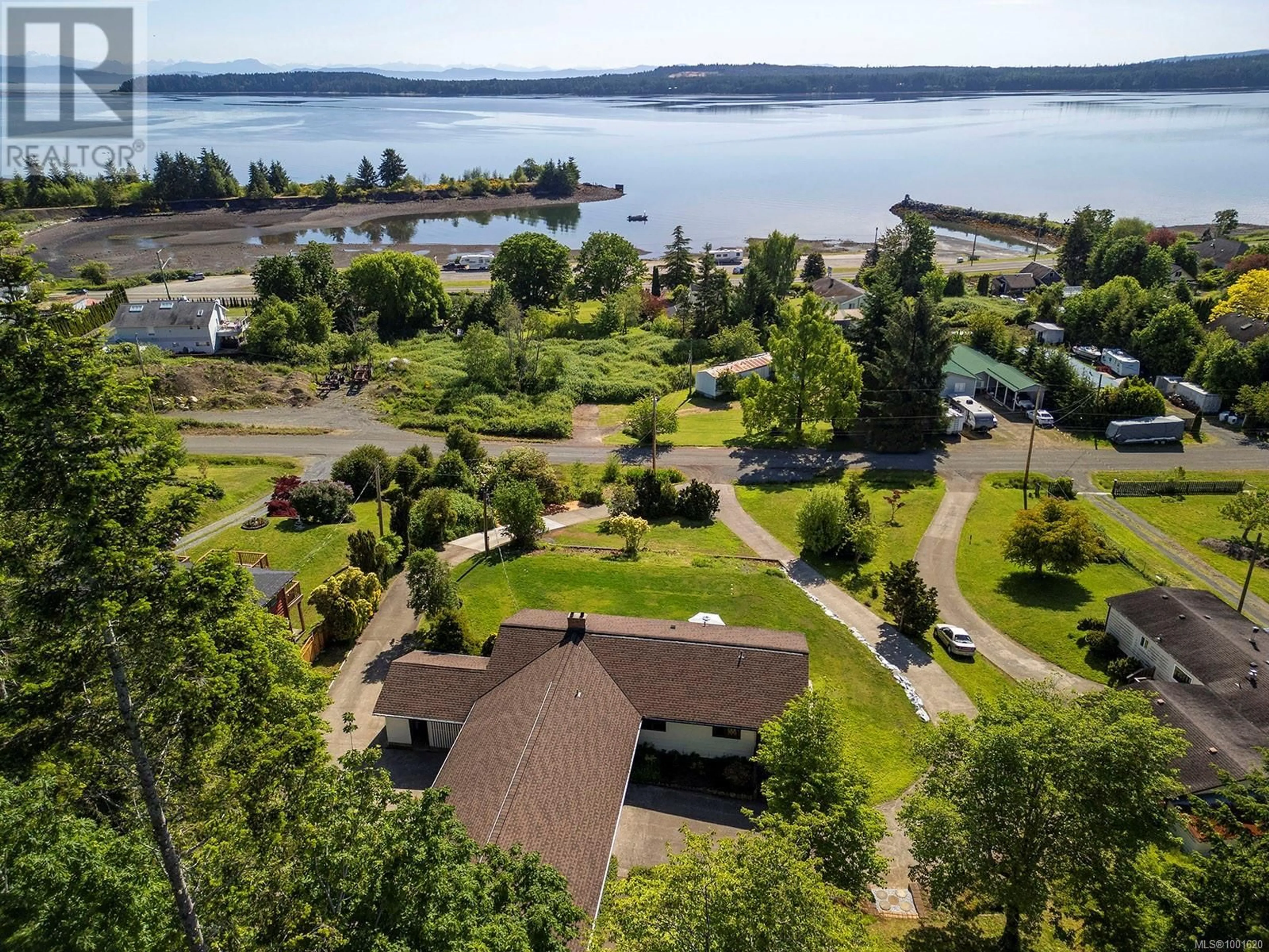 A pic from outside/outdoor area/front of a property/back of a property/a pic from drone, water/lake/river/ocean view for 5497 TAPPIN STREET, Union Bay British Columbia V0R3B0
