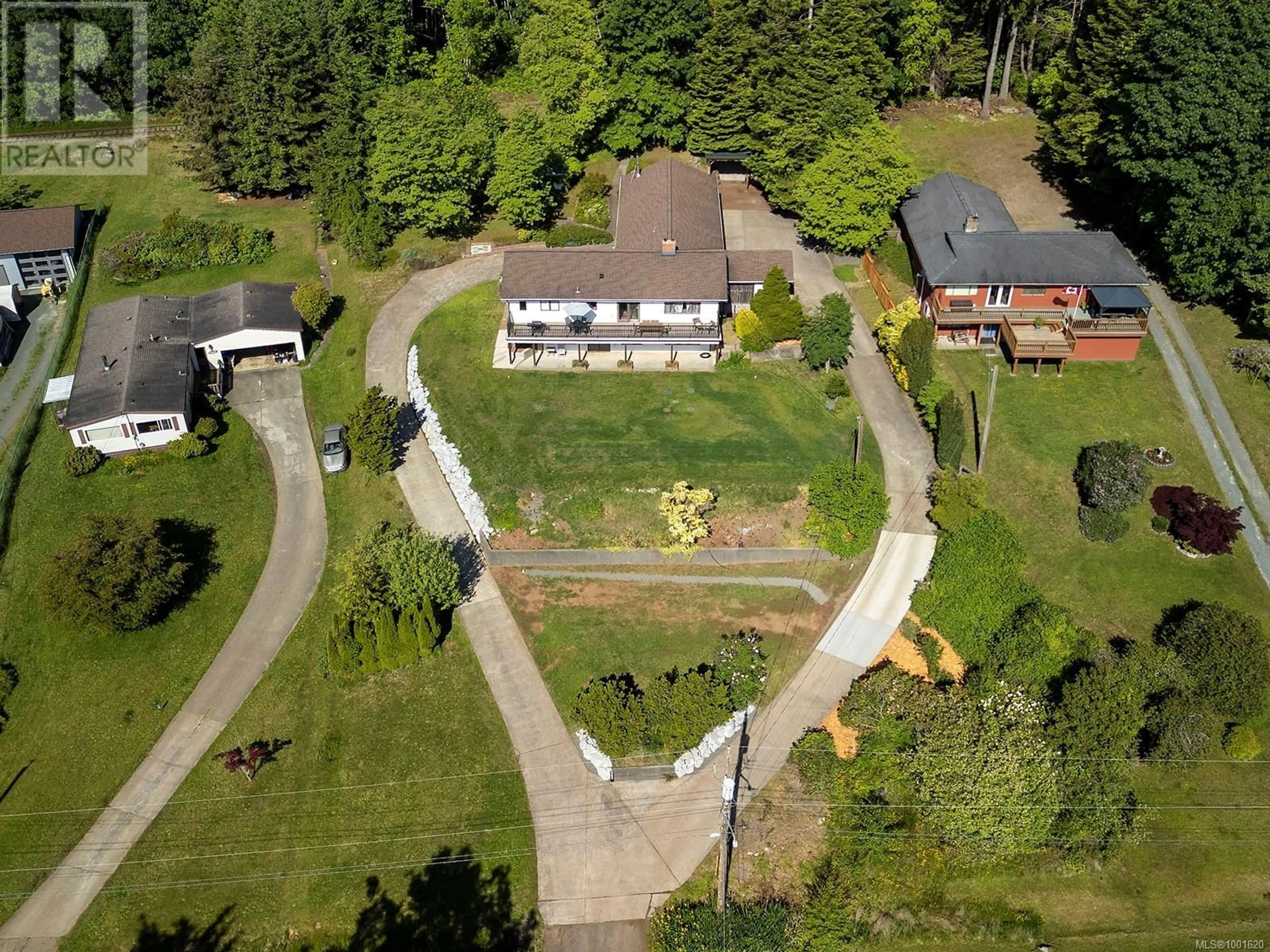 A pic from outside/outdoor area/front of a property/back of a property/a pic from drone, street for 5497 TAPPIN STREET, Union Bay British Columbia V0R3B0