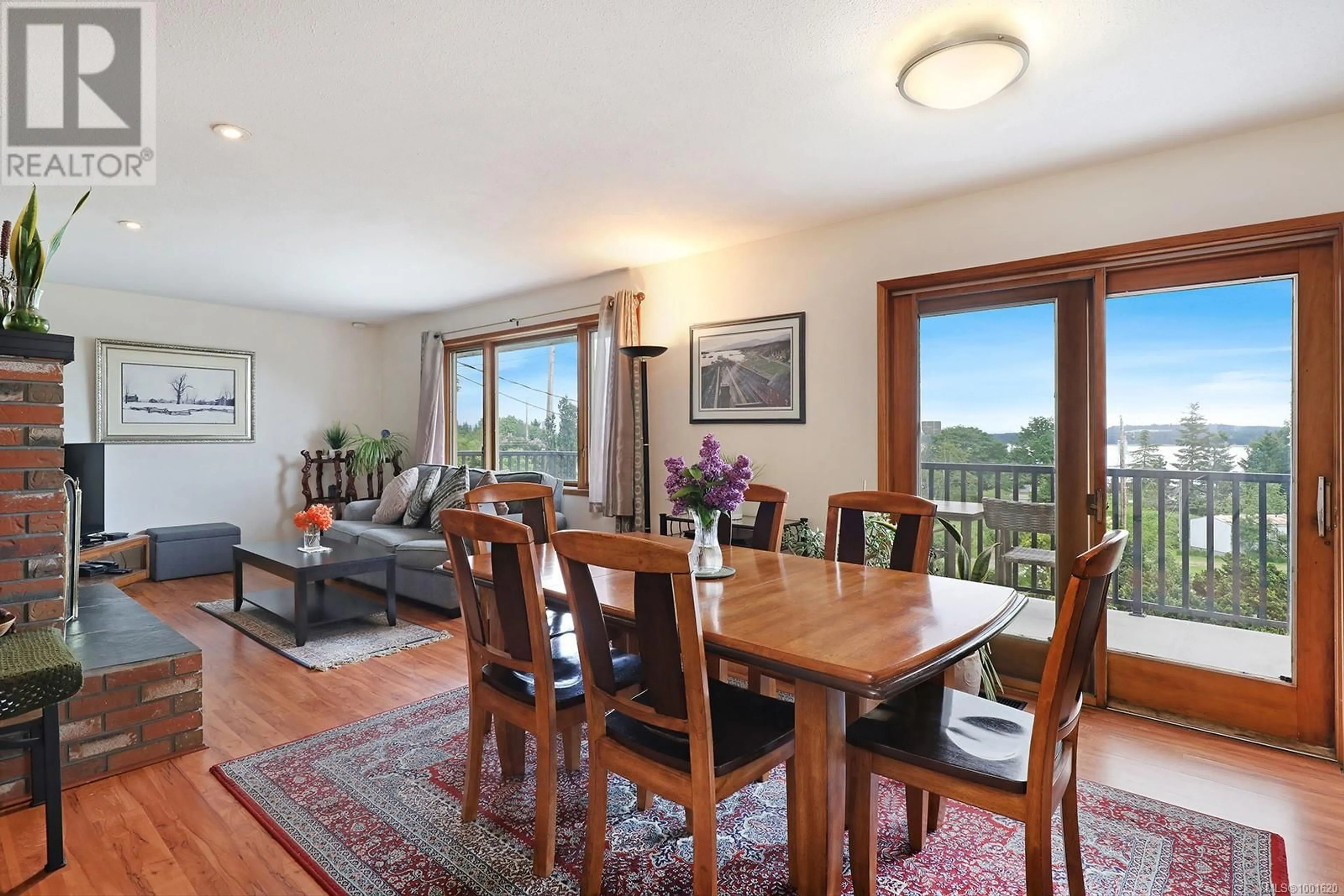 Dining room, wood/laminate floor for 5497 TAPPIN STREET, Union Bay British Columbia V0R3B0