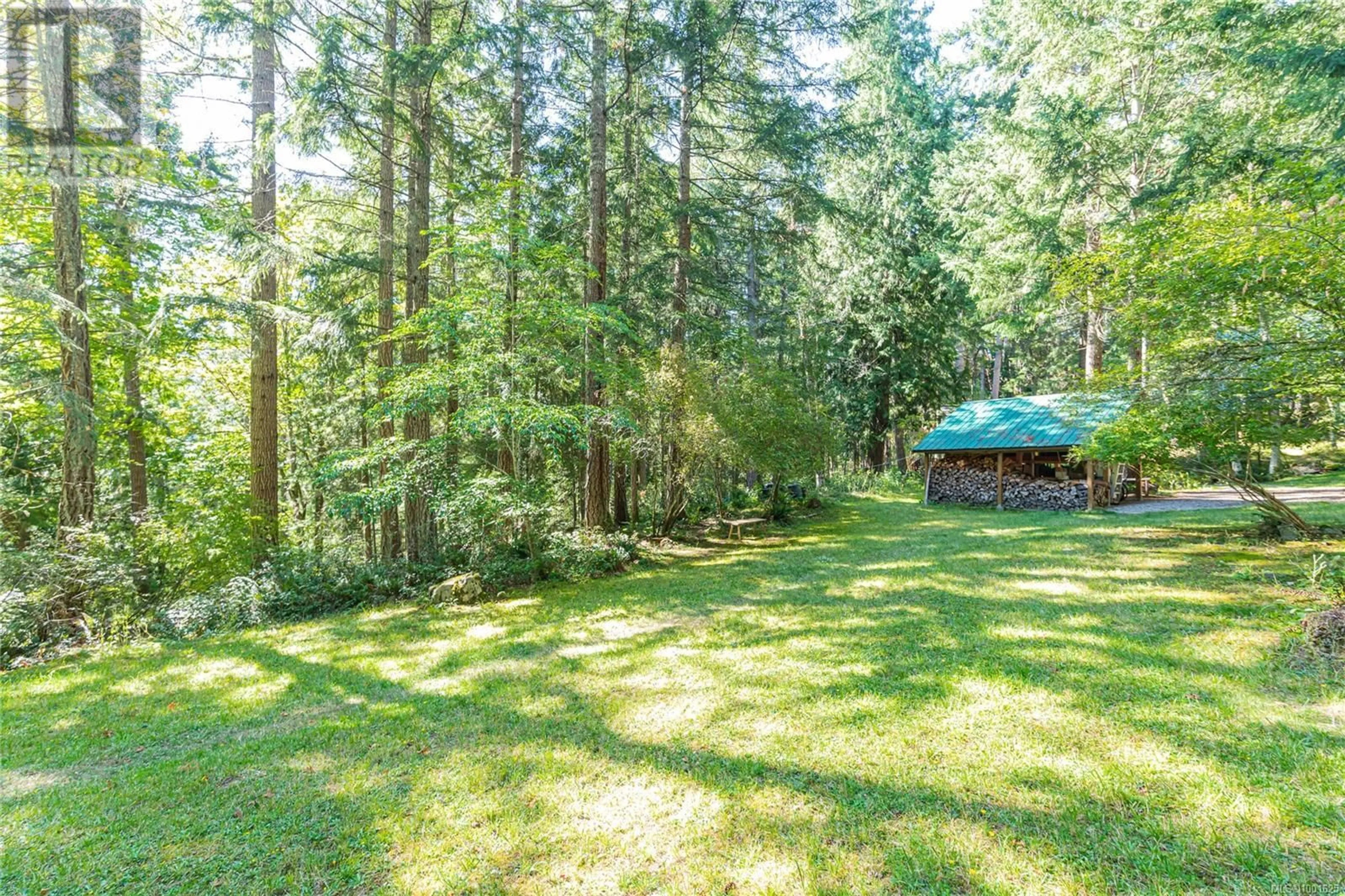 A pic from outside/outdoor area/front of a property/back of a property/a pic from drone, forest/trees view for 189 HOREL ROAD WEST, Salt Spring British Columbia V8K2A4