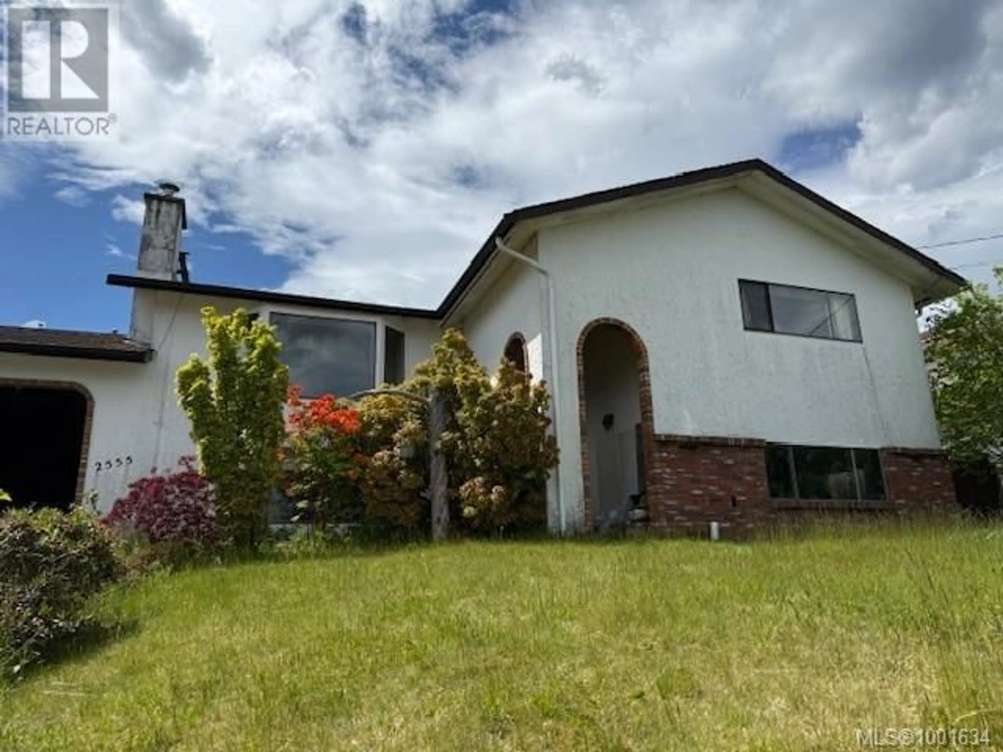 A pic from outside/outdoor area/front of a property/back of a property/a pic from drone, unknown for 2555 CARDENA CRESCENT, Port McNeill British Columbia V0R2R0