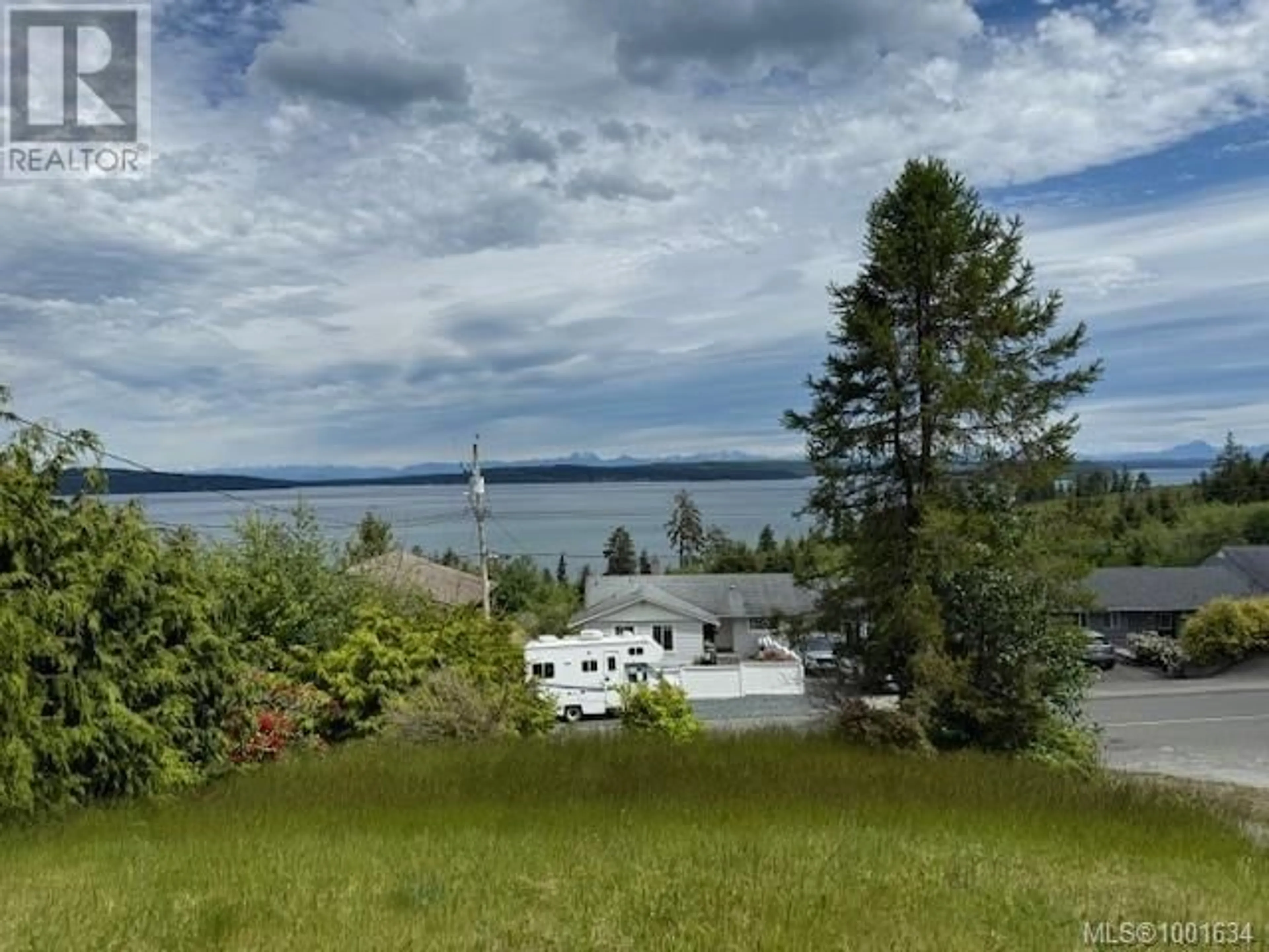 A pic from outside/outdoor area/front of a property/back of a property/a pic from drone, water/lake/river/ocean view for 2555 CARDENA CRESCENT, Port McNeill British Columbia V0R2R0