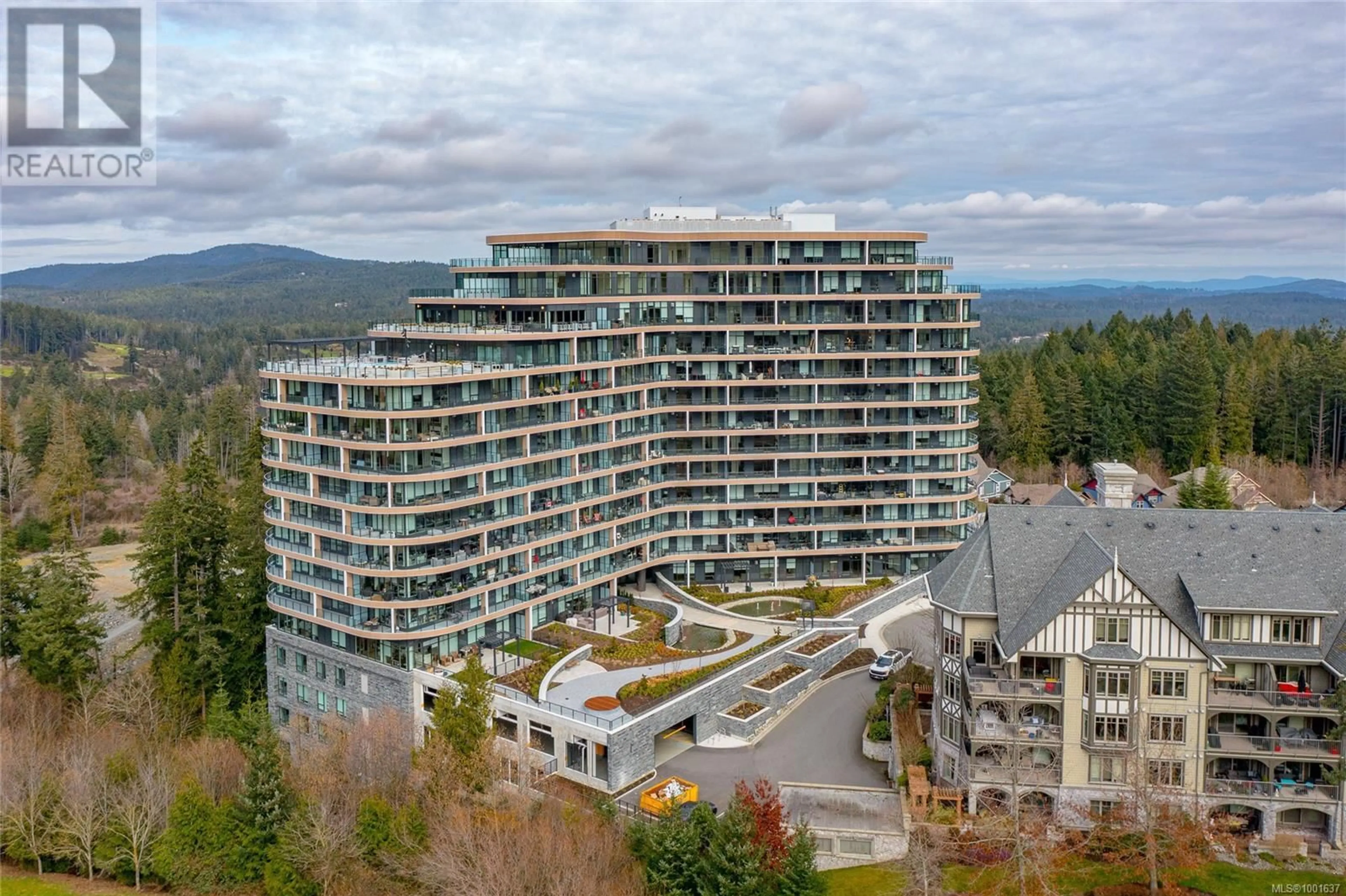 A pic from outside/outdoor area/front of a property/back of a property/a pic from drone, mountain view for 915 - 2000 HANNINGTON ROAD, Langford British Columbia V9B6R6