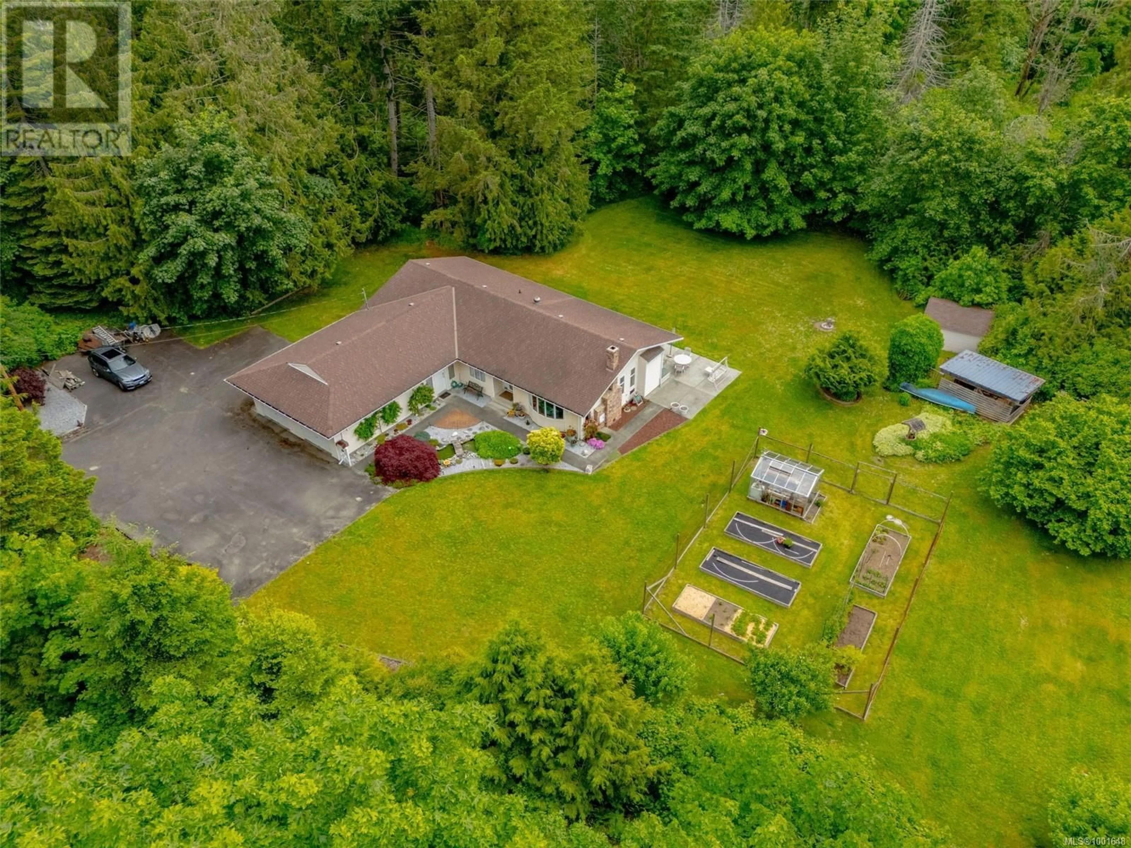 A pic from outside/outdoor area/front of a property/back of a property/a pic from drone, mountain view for 1760 WOOBANK ROAD, Nanaimo British Columbia V9X1G8