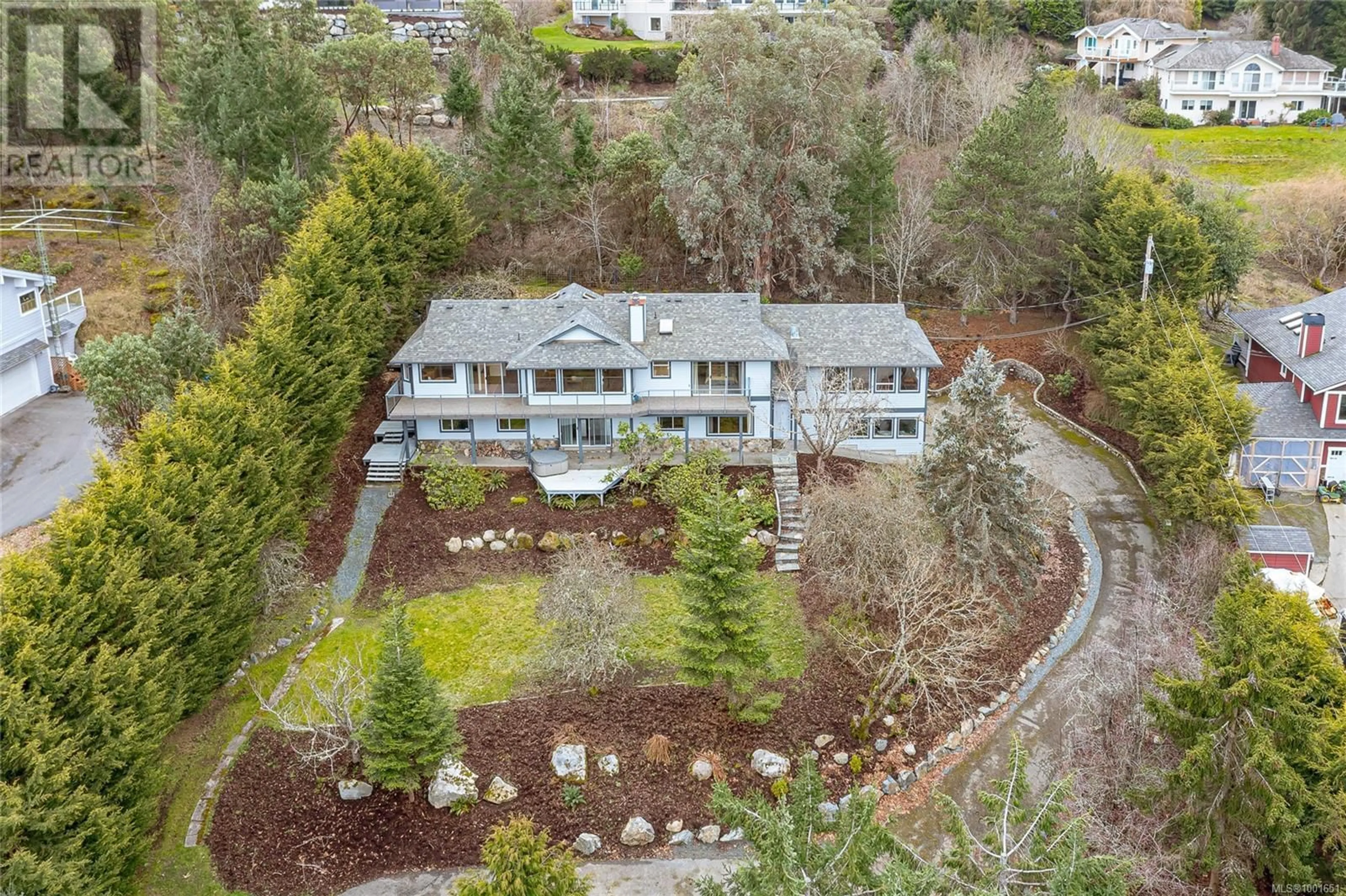 A pic from outside/outdoor area/front of a property/back of a property/a pic from drone, mountain view for 1319 LANDS END ROAD, North Saanich British Columbia V8L5K1