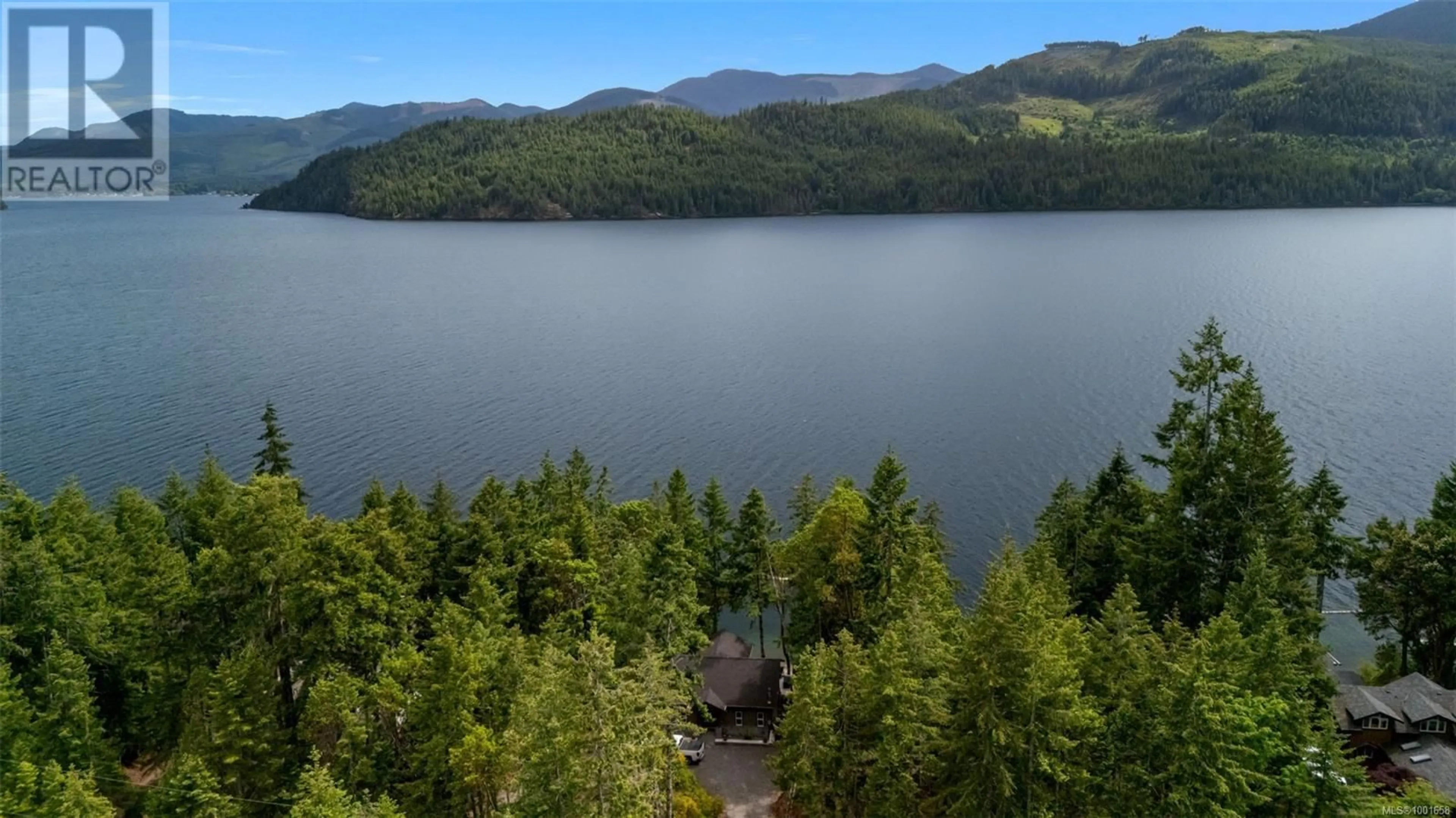 A pic from outside/outdoor area/front of a property/back of a property/a pic from drone, water/lake/river/ocean view for 8130 SA-SEEN-OS CRESCENT, Youbou British Columbia V0R3E1