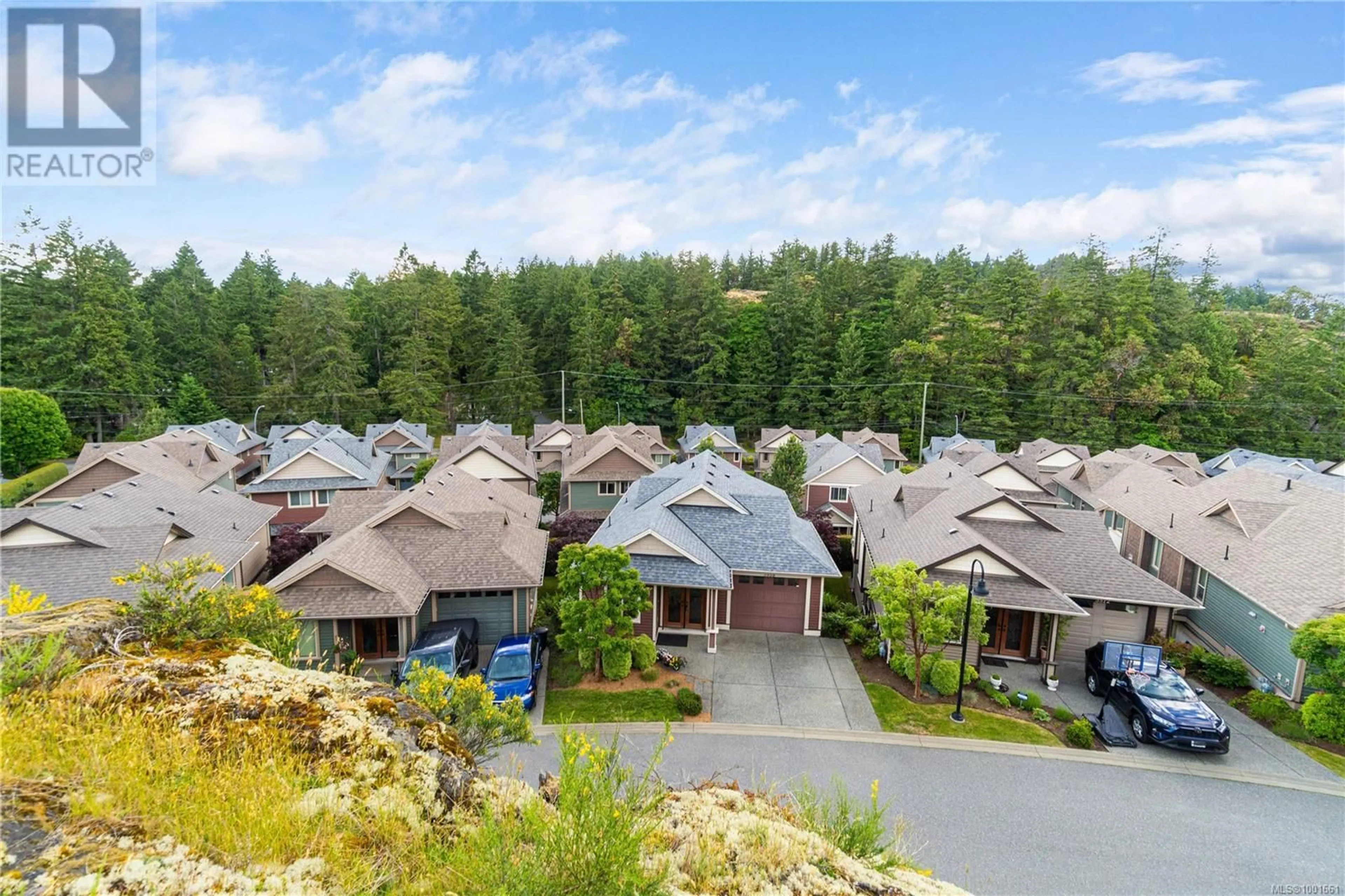 A pic from outside/outdoor area/front of a property/back of a property/a pic from drone, mountain view for 3508 RADHA WAY, Nanaimo British Columbia V9T0C7