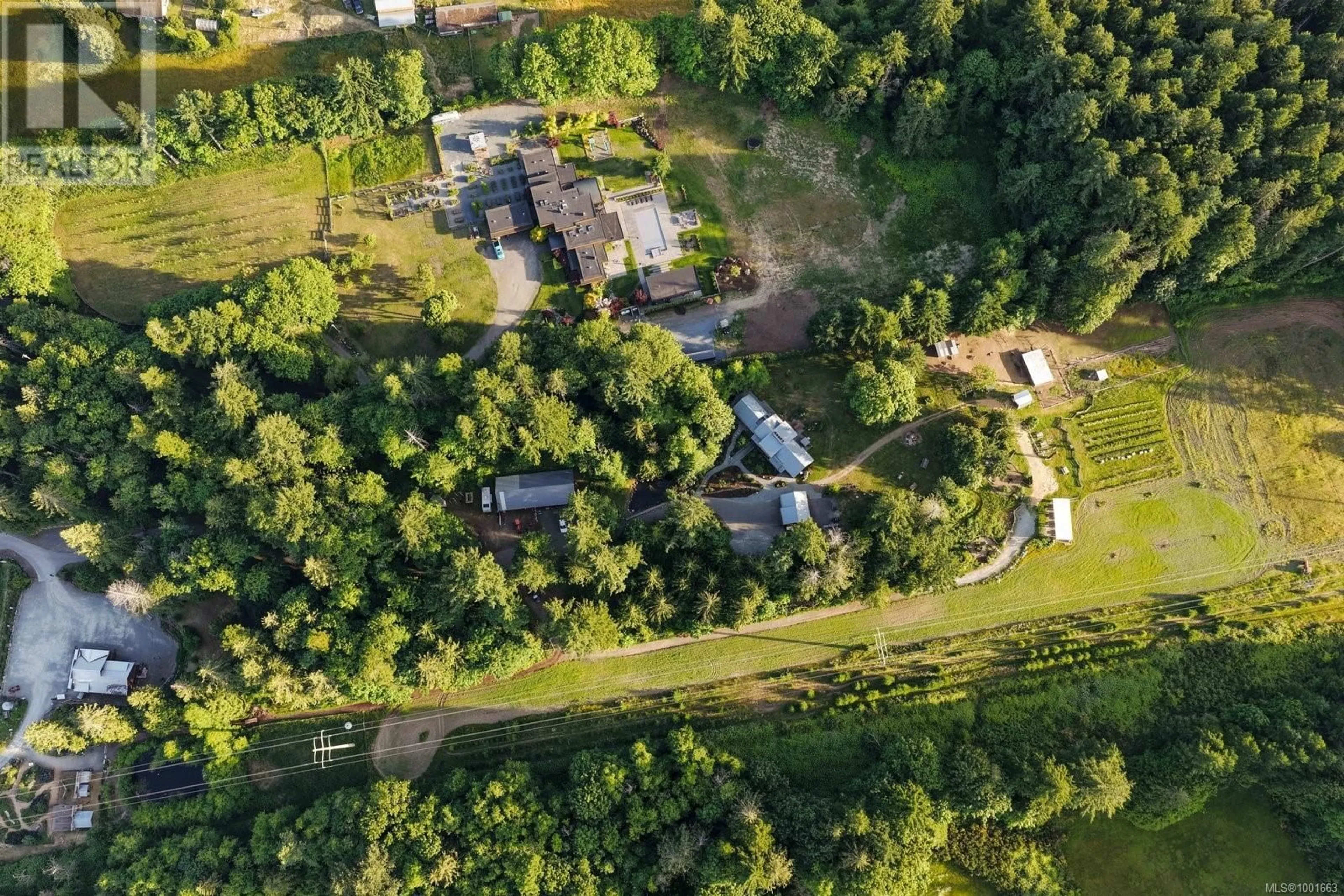 A pic from outside/outdoor area/front of a property/back of a property/a pic from drone, forest/trees view for 6440 WEST SAANICH ROAD, Central Saanich British Columbia V8M1W8