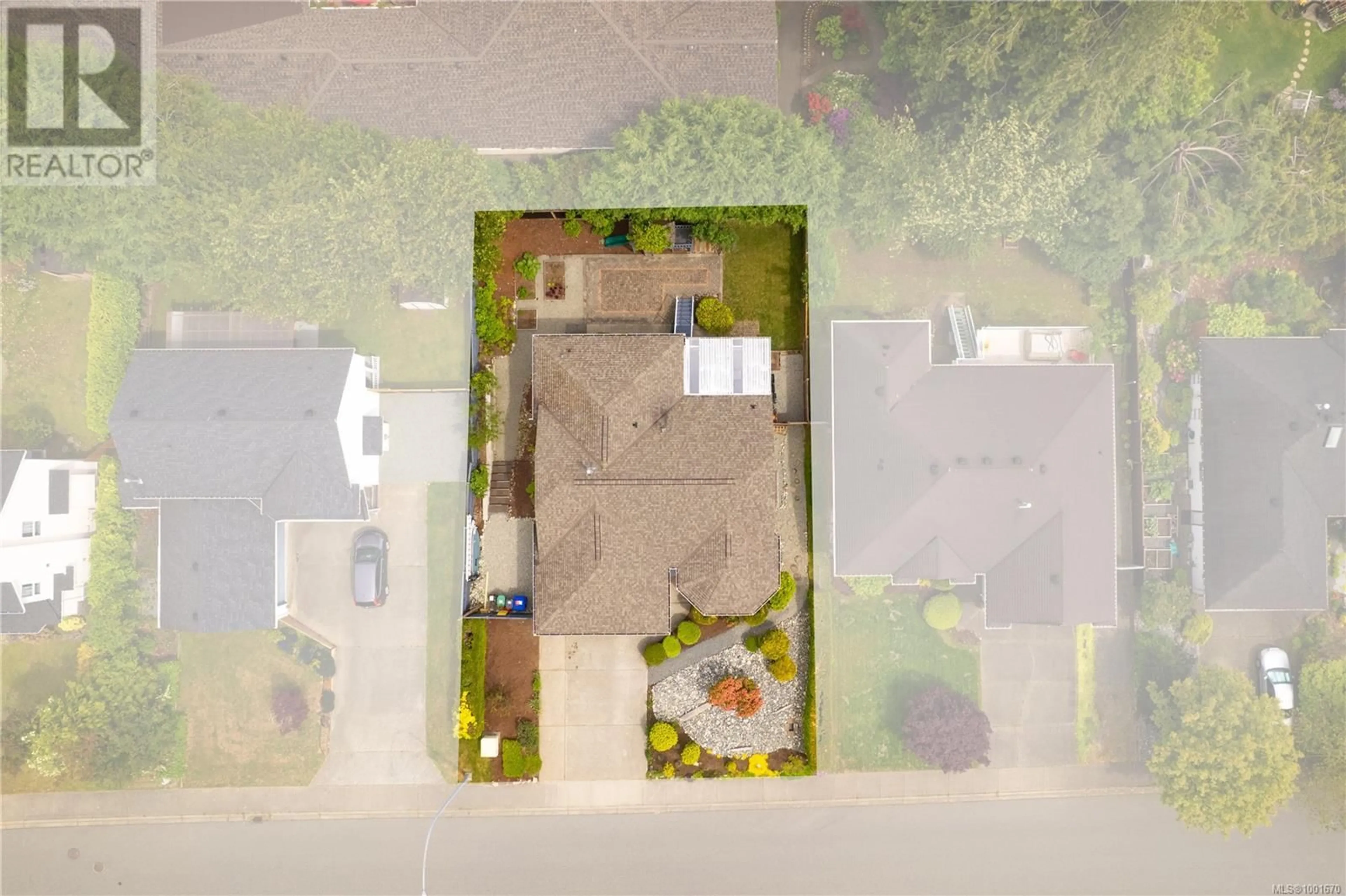 A pic from outside/outdoor area/front of a property/back of a property/a pic from drone, street for 5566 GARIBALDI DRIVE, Nanaimo British Columbia V9T6B2