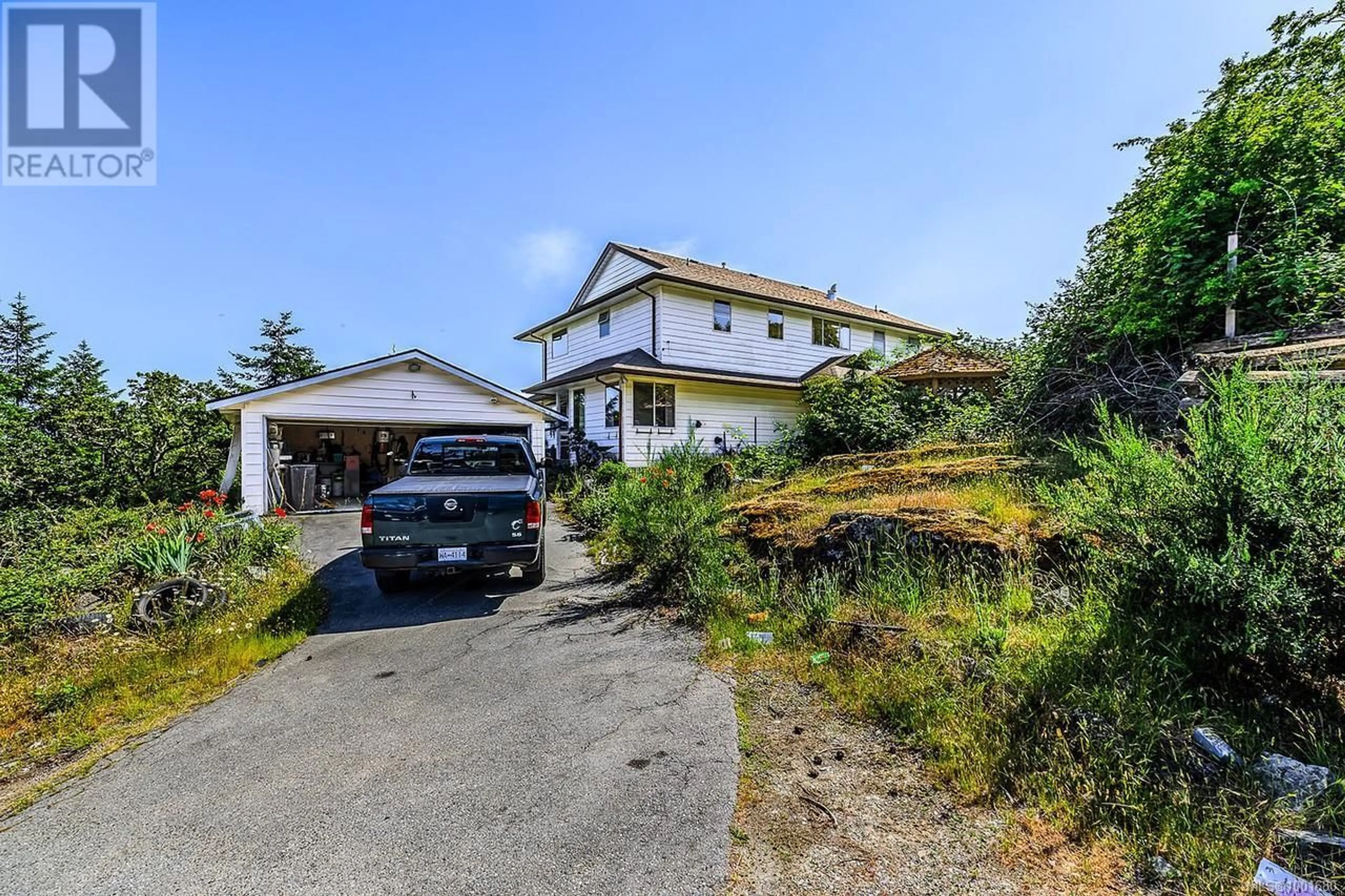 A pic from outside/outdoor area/front of a property/back of a property/a pic from drone, street for 1573 SCARLET HILL ROAD, Nanaimo British Columbia V9T1J2