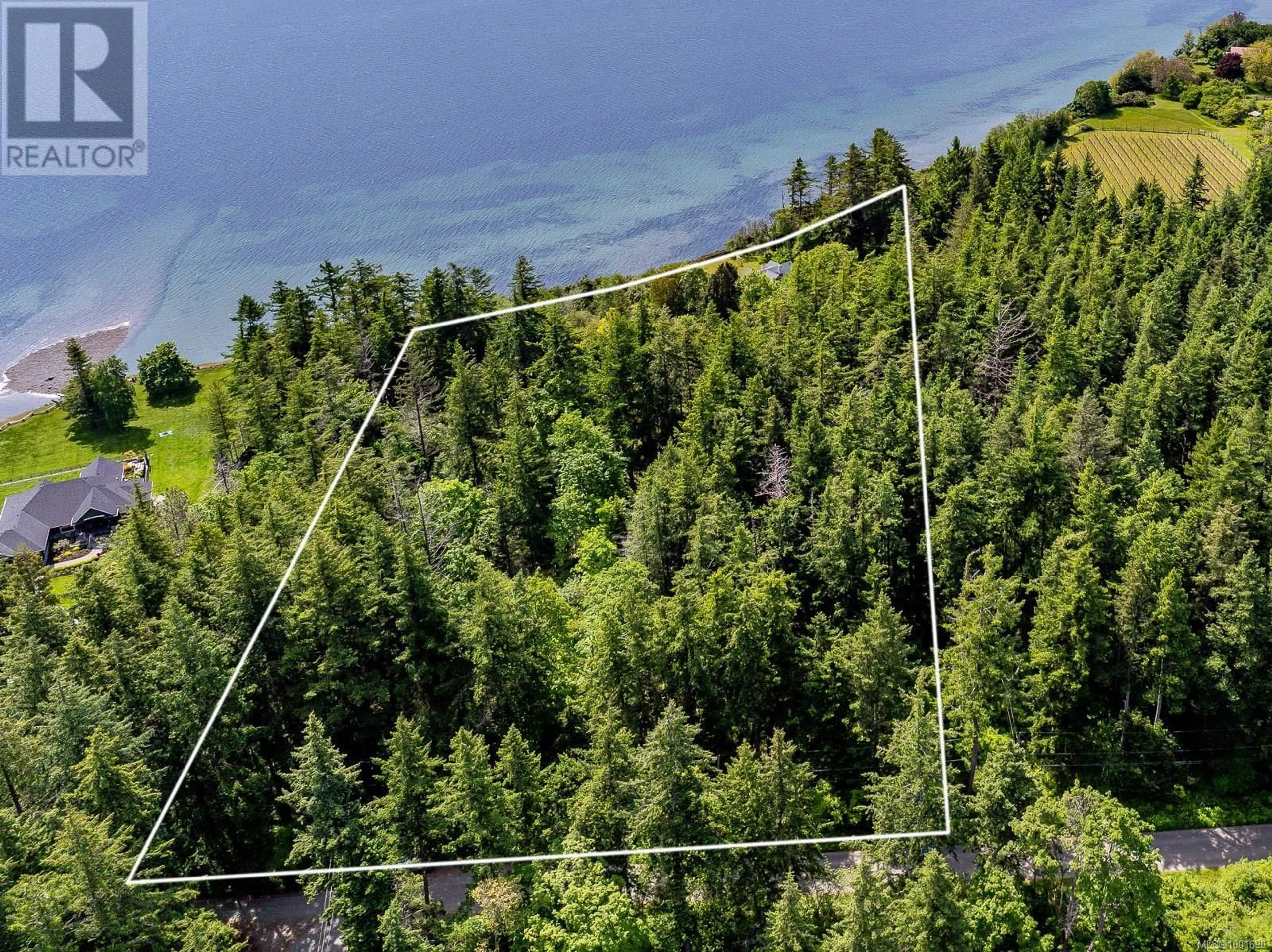 A pic from outside/outdoor area/front of a property/back of a property/a pic from drone, forest/trees view for 965 BALMORAL ROAD, Comox British Columbia V9M3W2