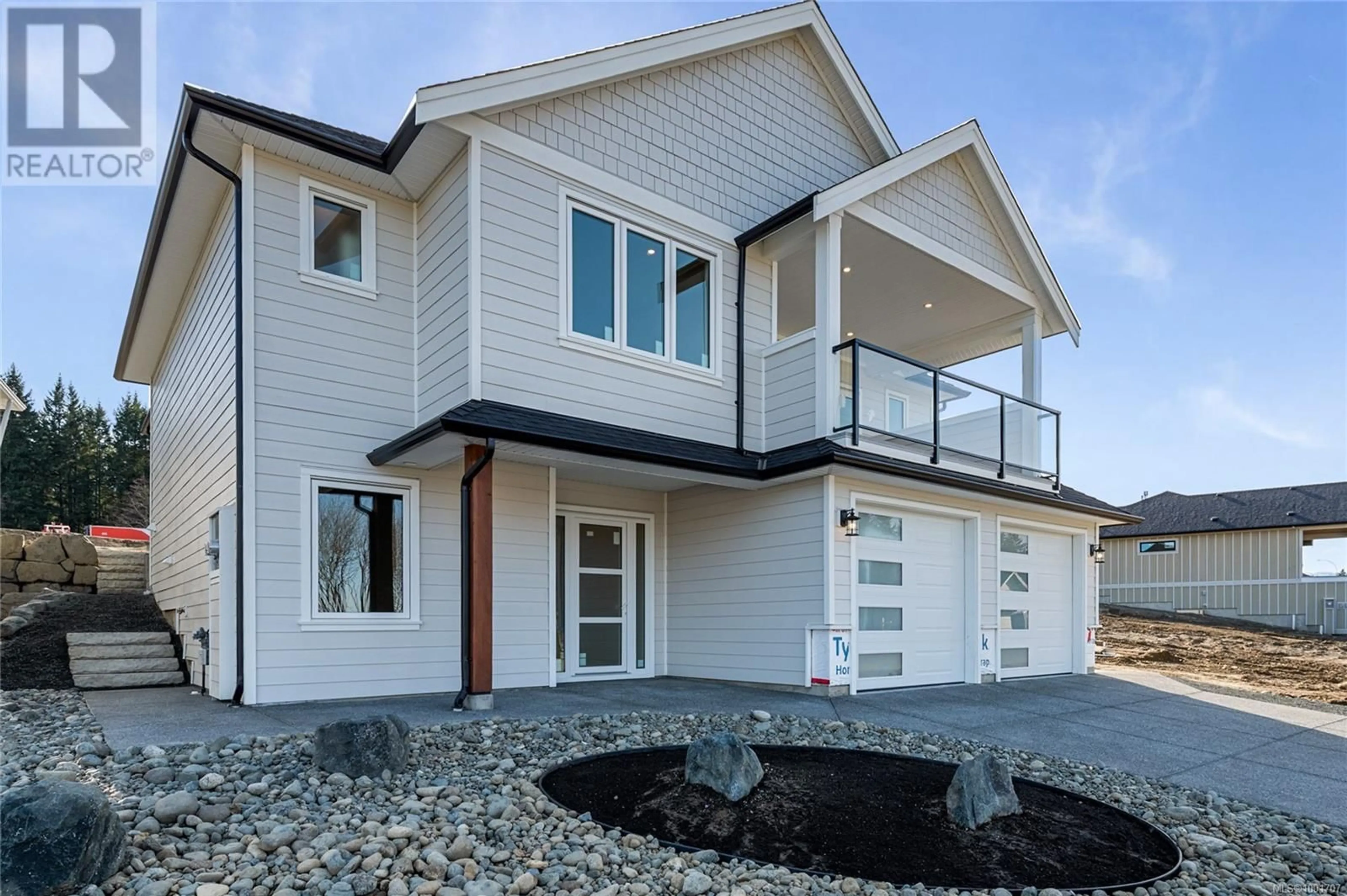 Home with vinyl exterior material, street for 1783 CROWN ISLE BOULEVARD, Courtenay British Columbia V9N9X5
