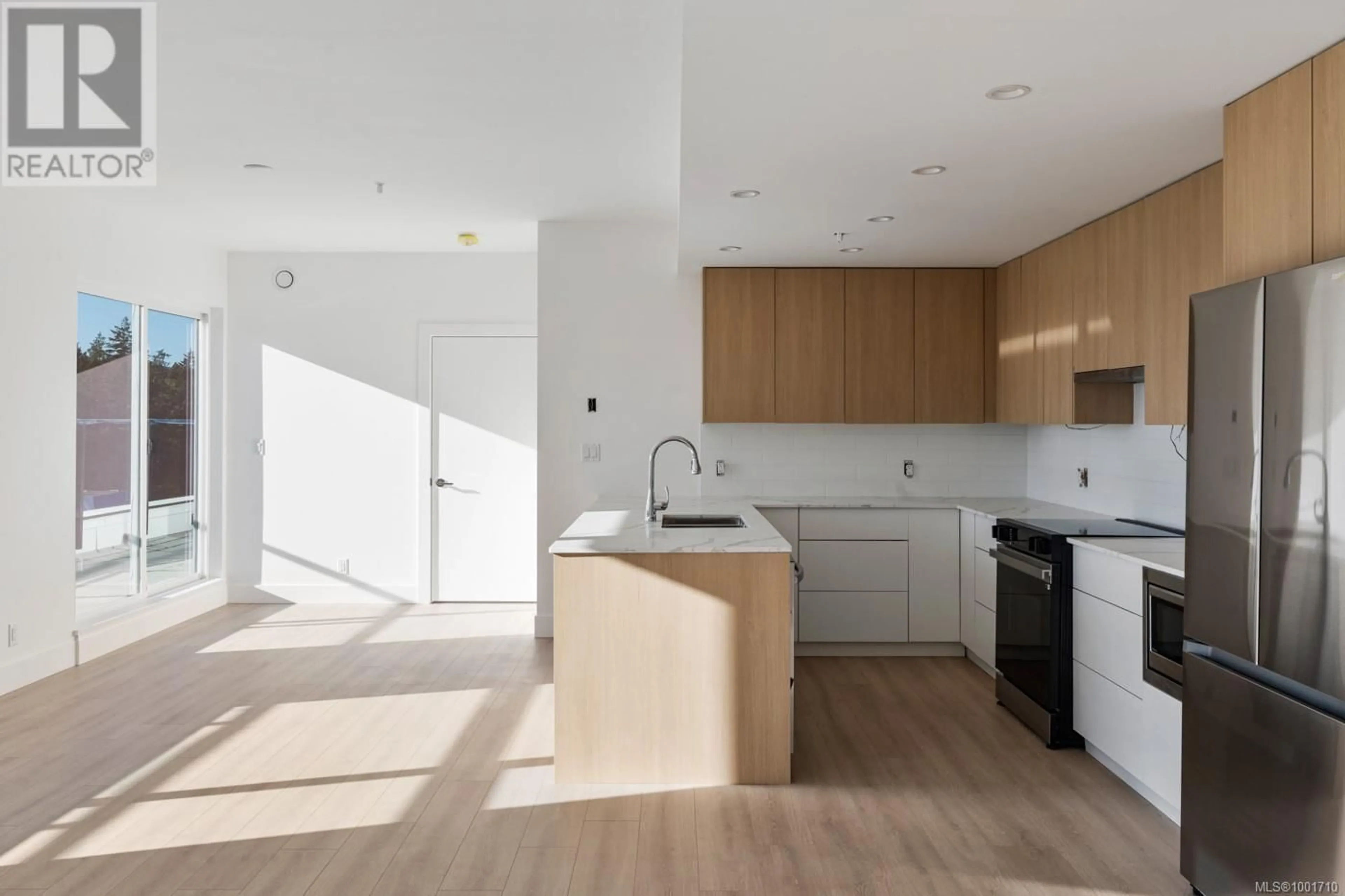 Open concept kitchen, unknown for 202 - 258 HELMCKEN ROAD, View Royal British Columbia X0X0X0