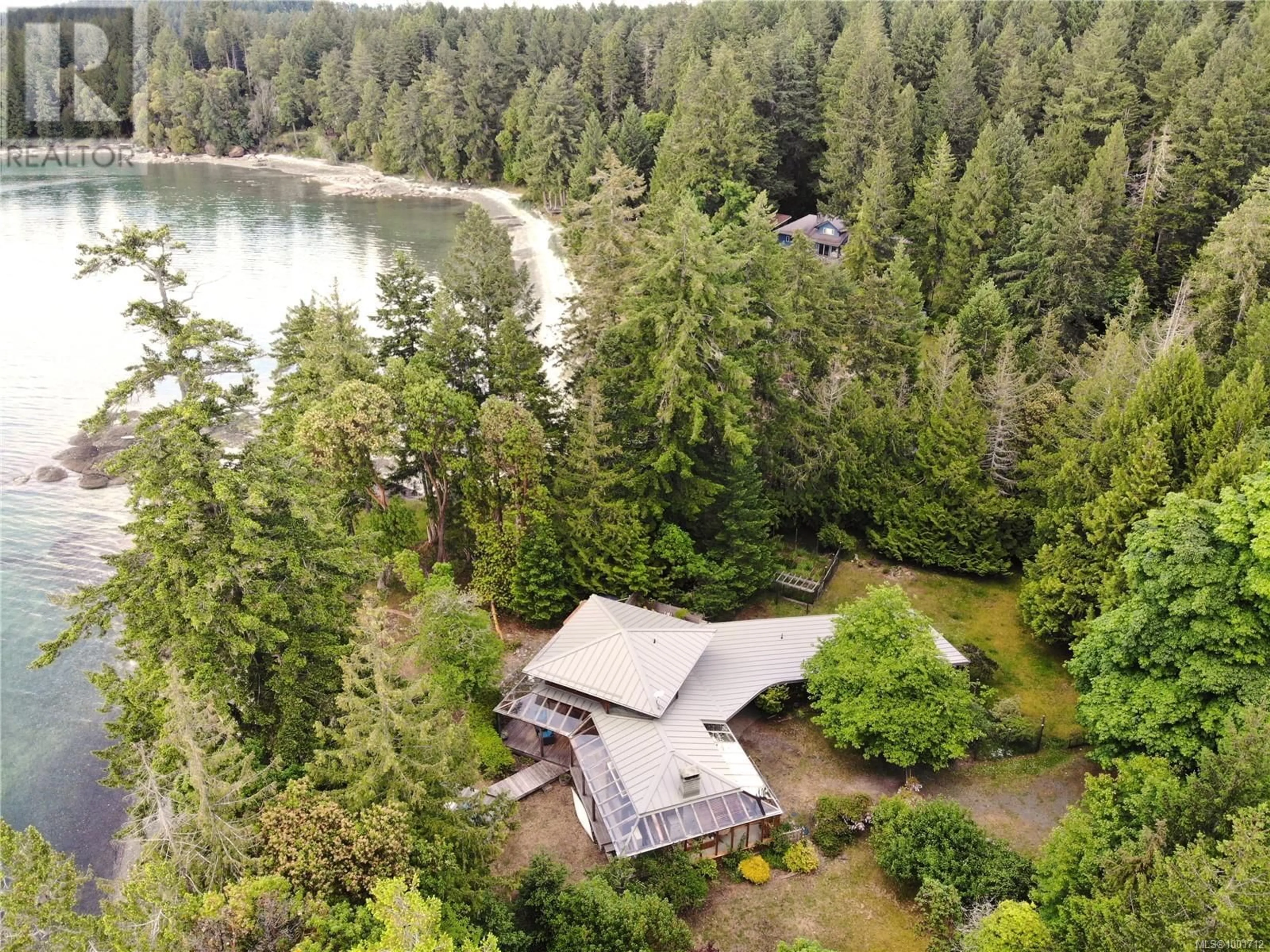 A pic from outside/outdoor area/front of a property/back of a property/a pic from drone, water/lake/river/ocean view for 7161 KOMAS ROAD, Denman Island British Columbia V0R1T0