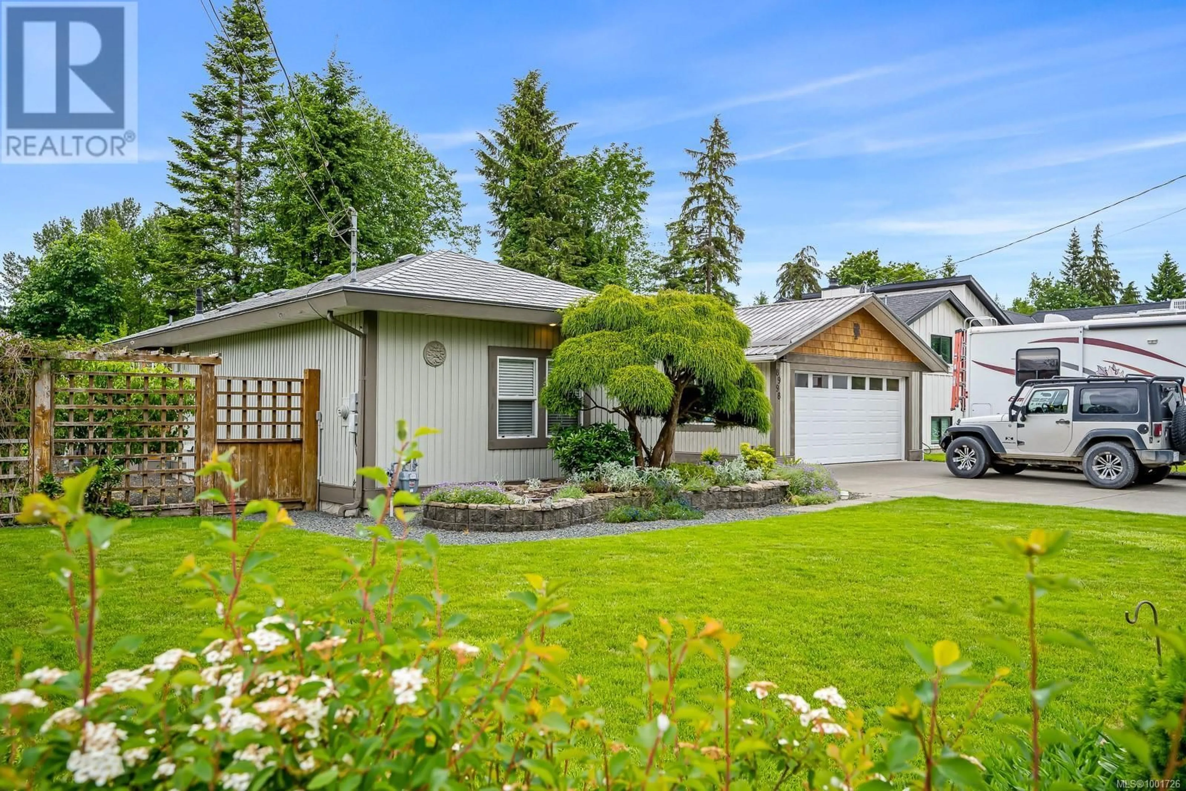 Home with vinyl exterior material, street for 8998 MCLAREY AVENUE, Black Creek British Columbia V9J1A2