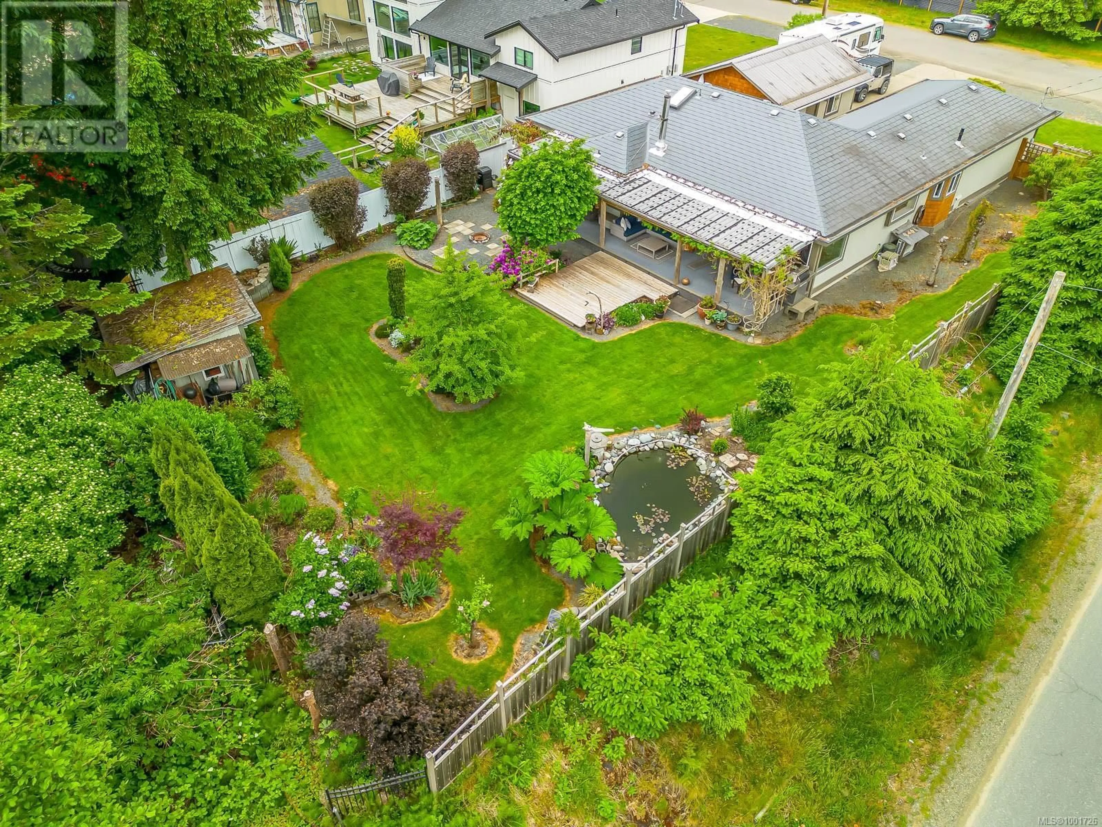 A pic from outside/outdoor area/front of a property/back of a property/a pic from drone, street for 8998 MCLAREY AVENUE, Black Creek British Columbia V9J1A2