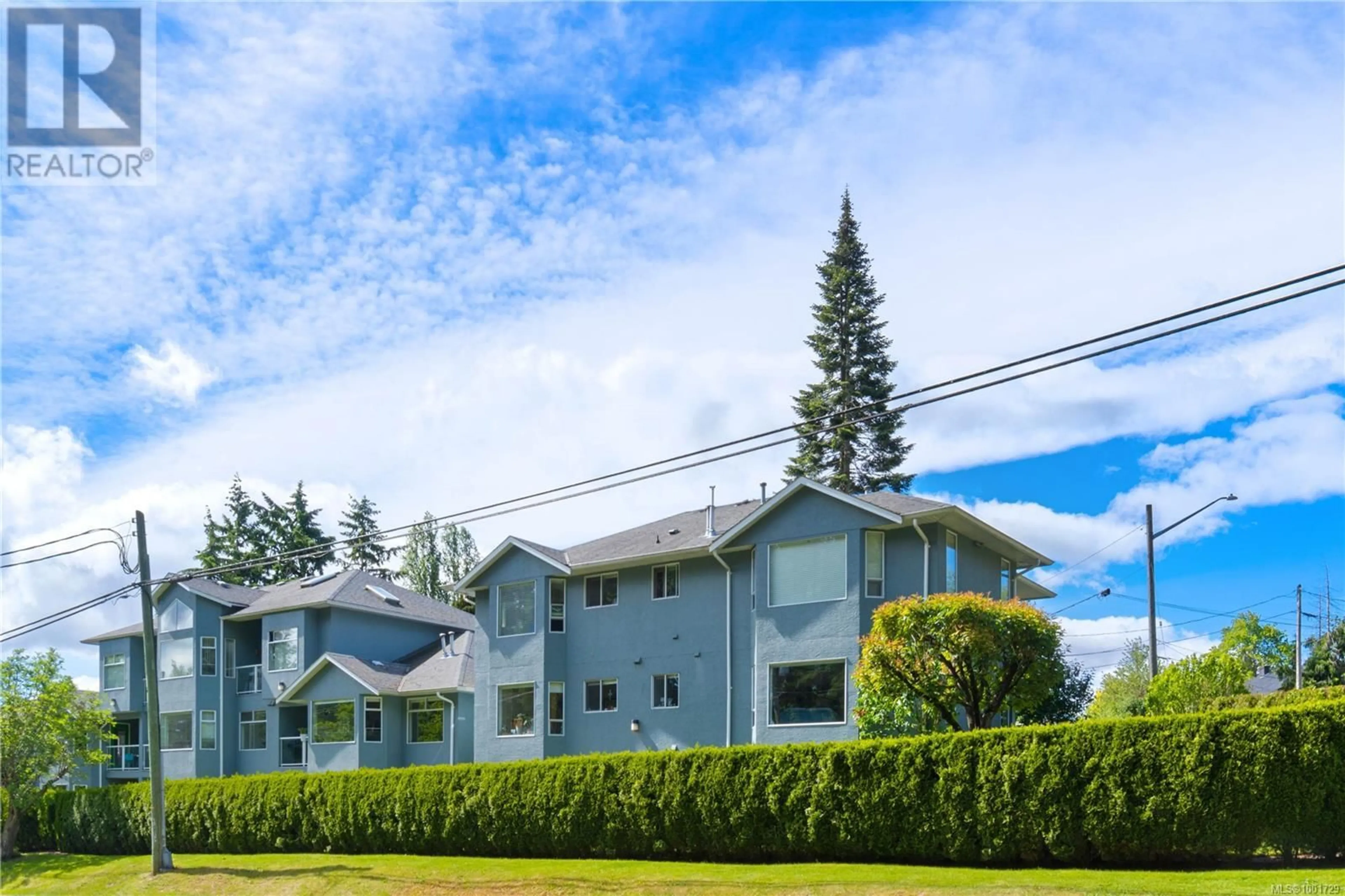 A pic from outside/outdoor area/front of a property/back of a property/a pic from drone, mountain view for 202 - 2 DORIC AVENUE, Nanaimo British Columbia V9R3N1