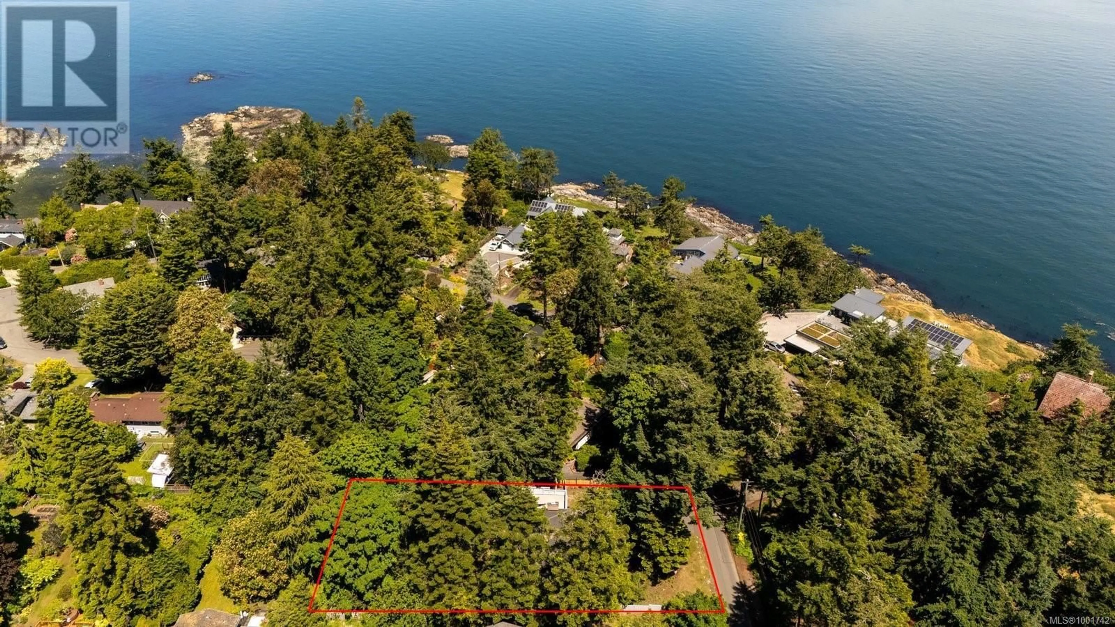 A pic from outside/outdoor area/front of a property/back of a property/a pic from drone, water/lake/river/ocean view for 4606 VANTREIGHT DRIVE, Saanich British Columbia V8N3W9