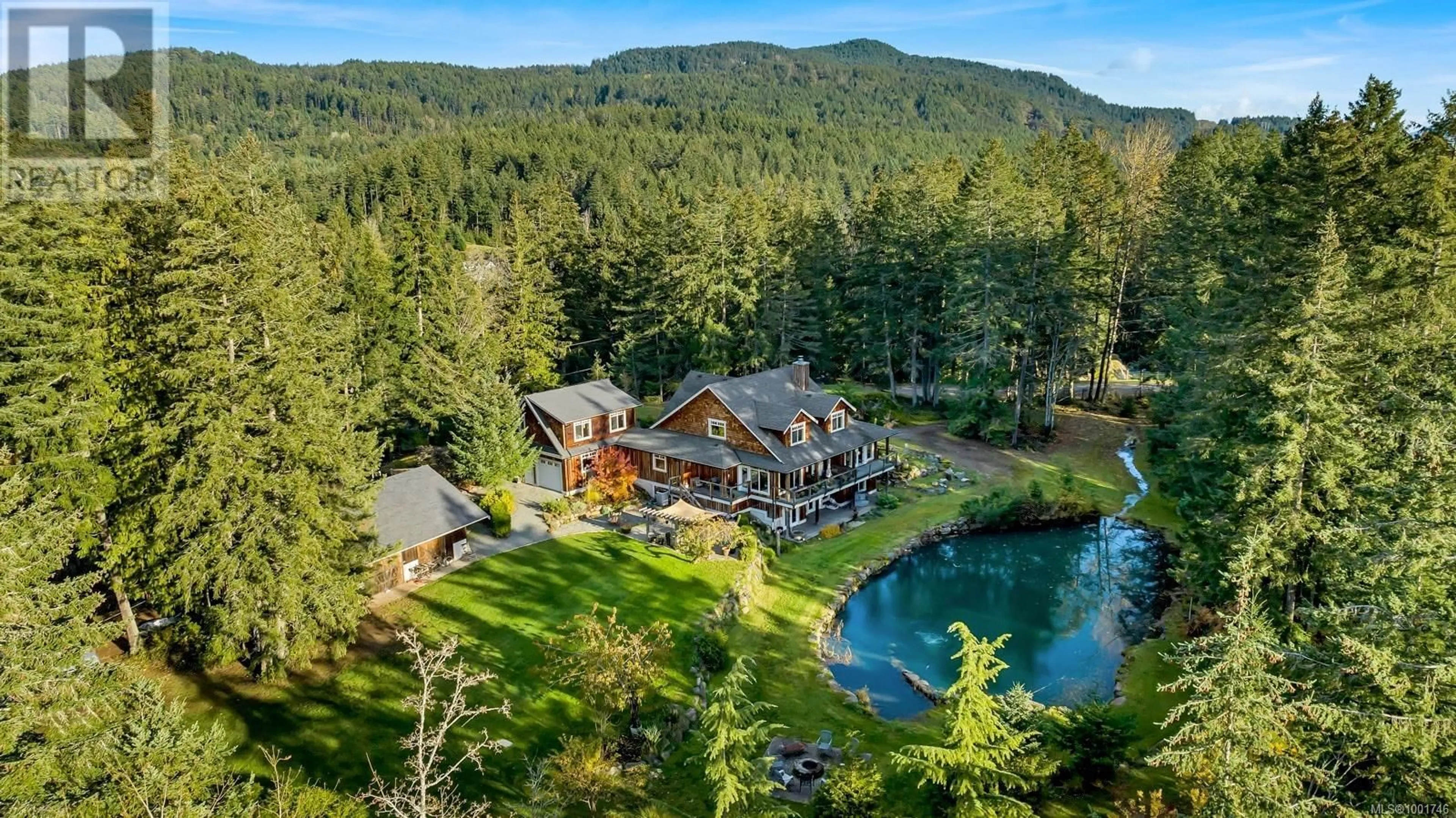A pic from outside/outdoor area/front of a property/back of a property/a pic from drone, water/lake/river/ocean view for 7338 WALTON MOUNTAIN ROAD, Duncan British Columbia V9L5W8