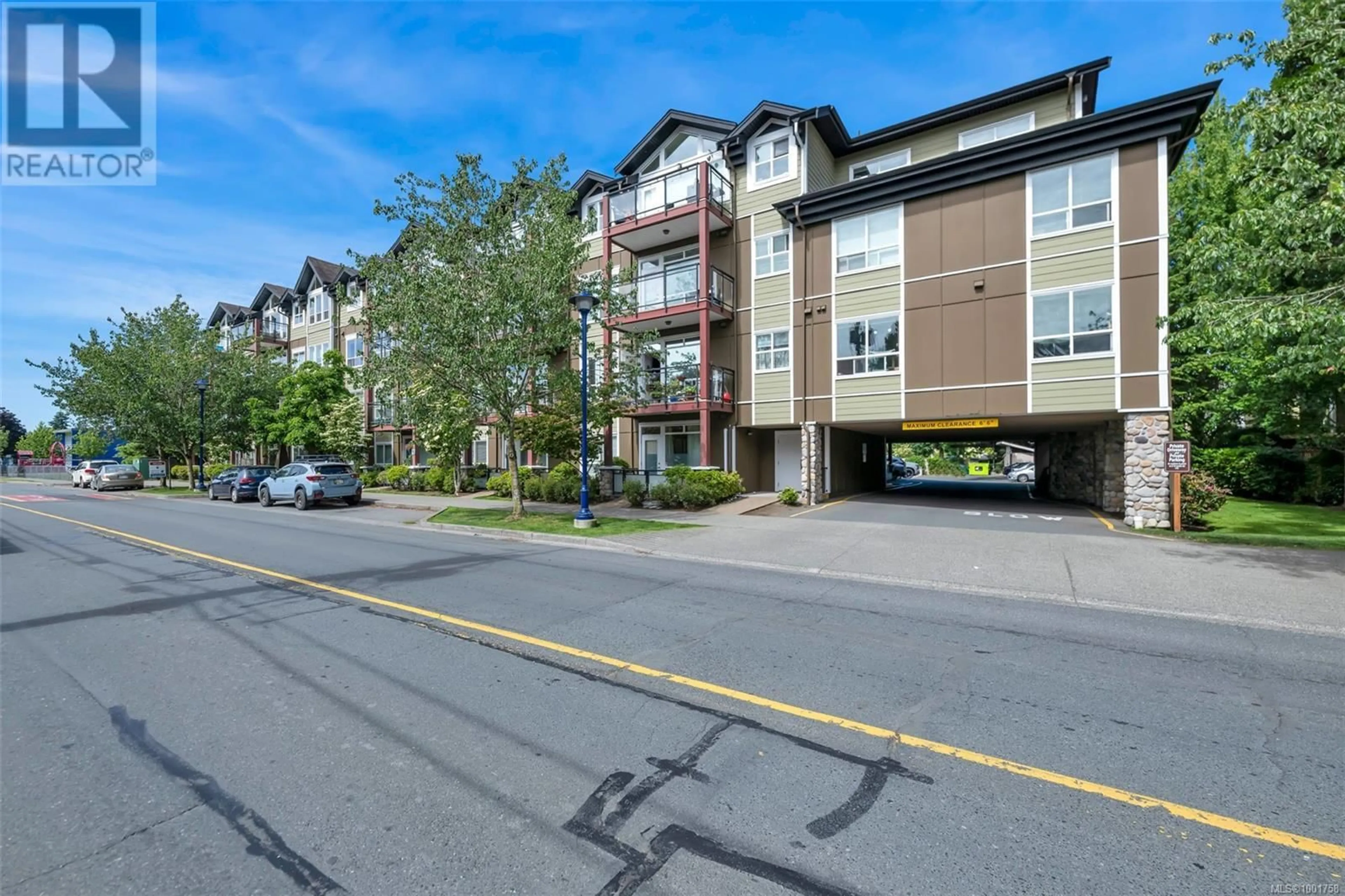 A pic from outside/outdoor area/front of a property/back of a property/a pic from drone, street for 406 - 2710 JACKLIN ROAD, Langford British Columbia V9B0K5