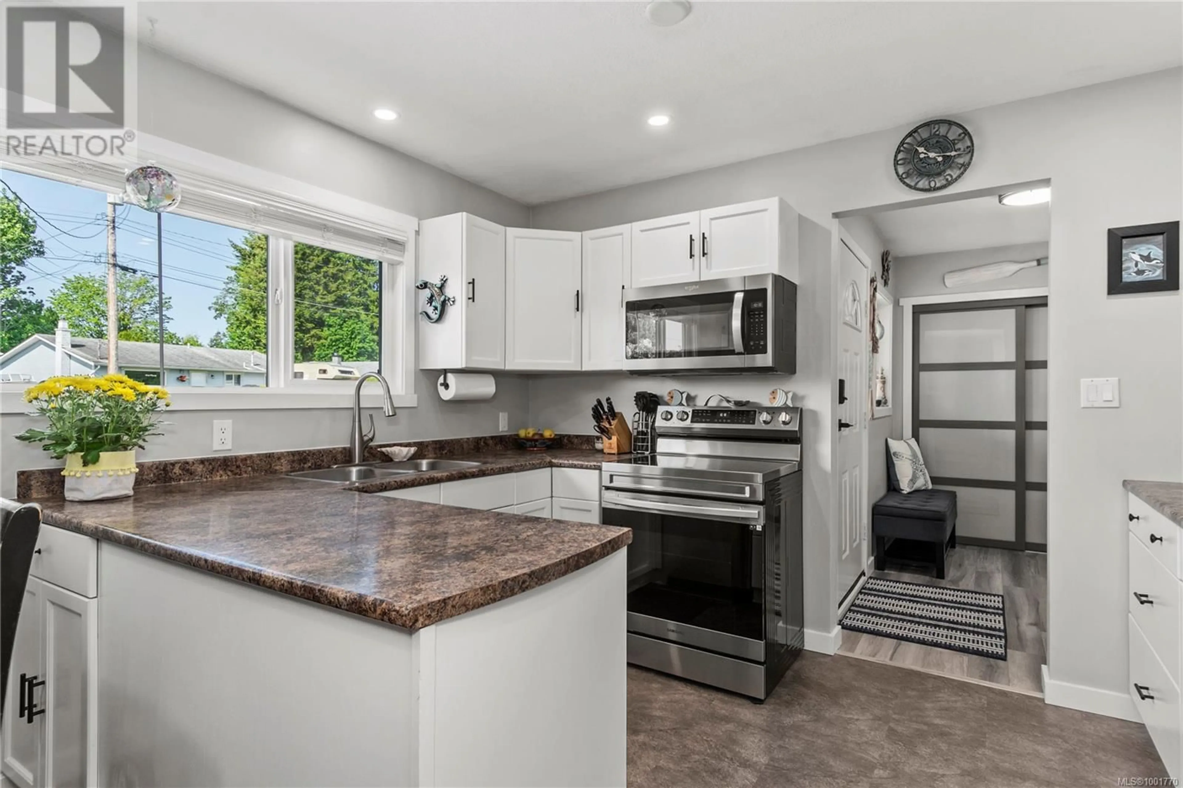 Open concept kitchen, ceramic/tile floor for 2151 ARNASON ROAD, Campbell River British Columbia V9W5Z4