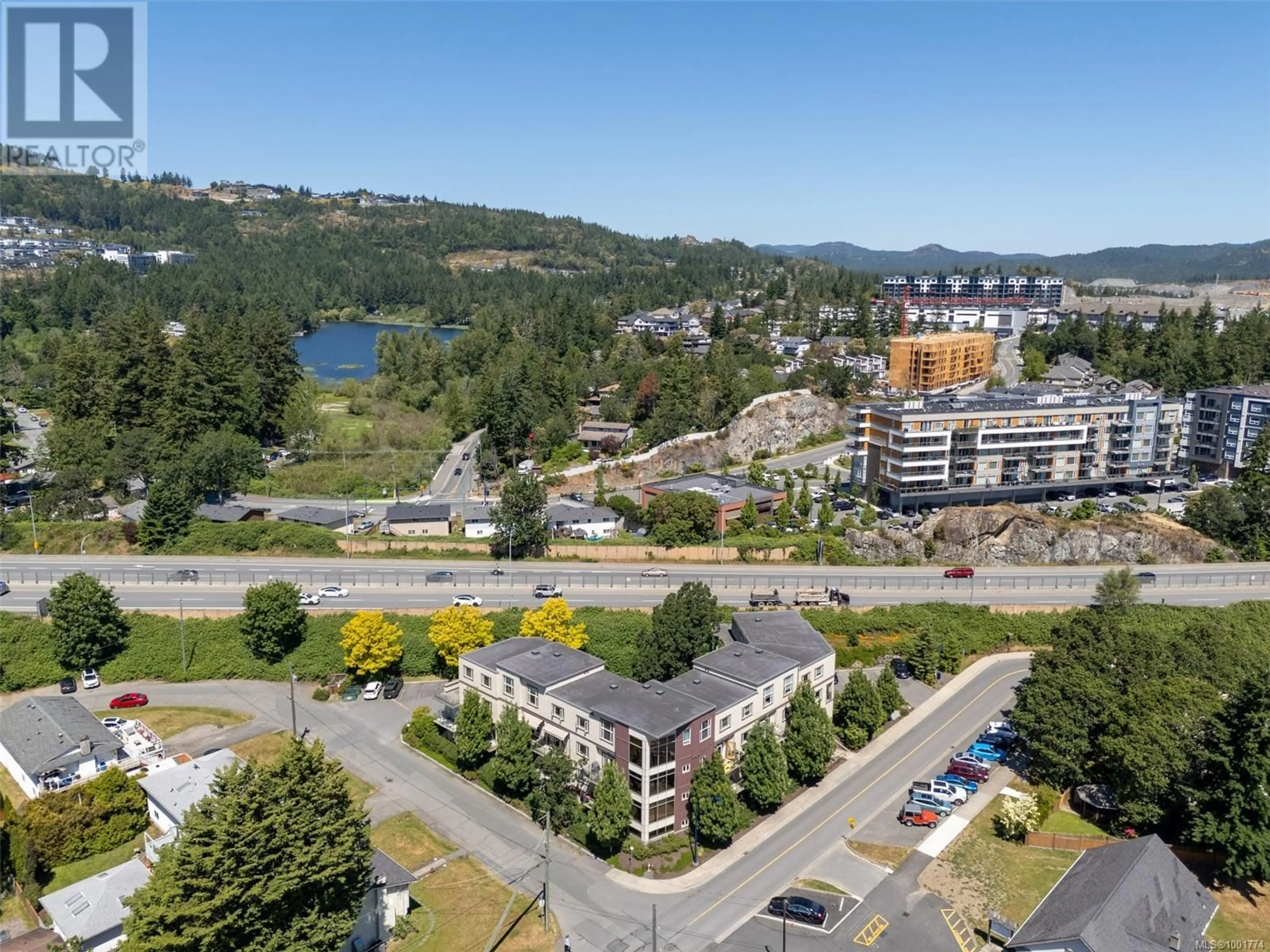 A pic from outside/outdoor area/front of a property/back of a property/a pic from drone, water/lake/river/ocean view for 307 - 2732 MATSON ROAD, Langford British Columbia V9B3Z2