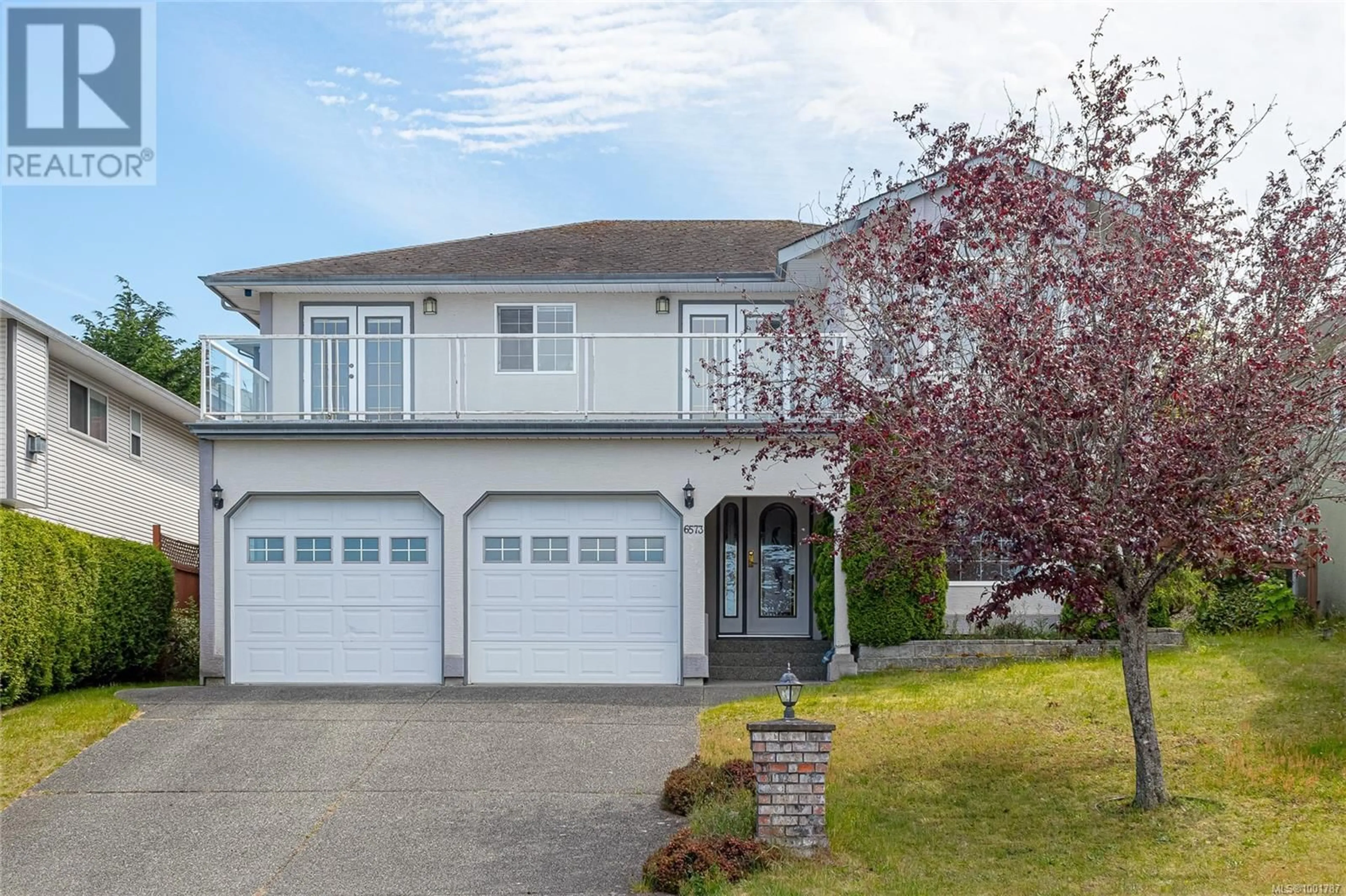 Home with vinyl exterior material, street for 6573 PELICAN WAY, Nanaimo British Columbia V9V1P9