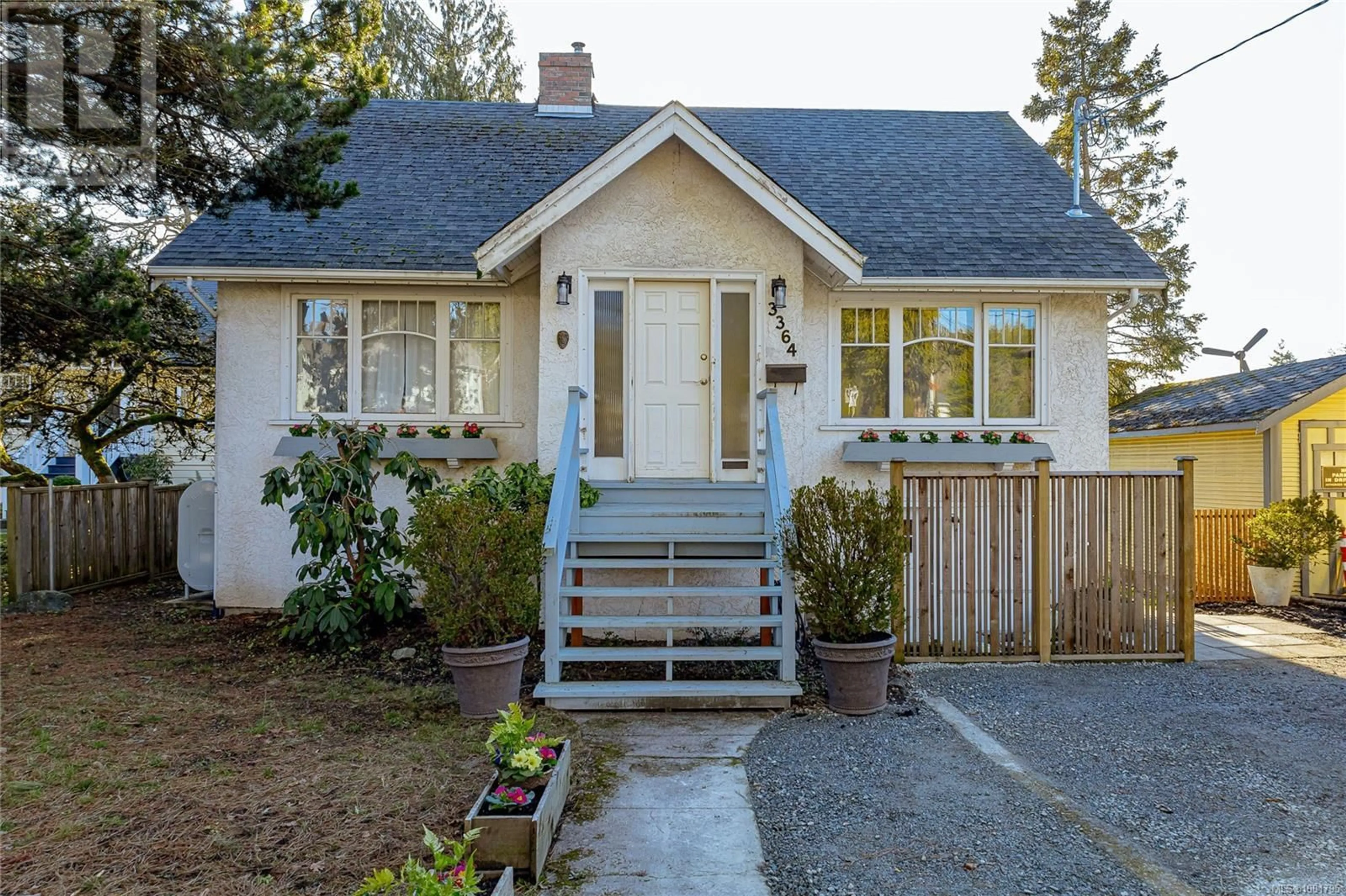 Home with vinyl exterior material, street for 3364 COOK STREET, Saanich British Columbia V8X1A8