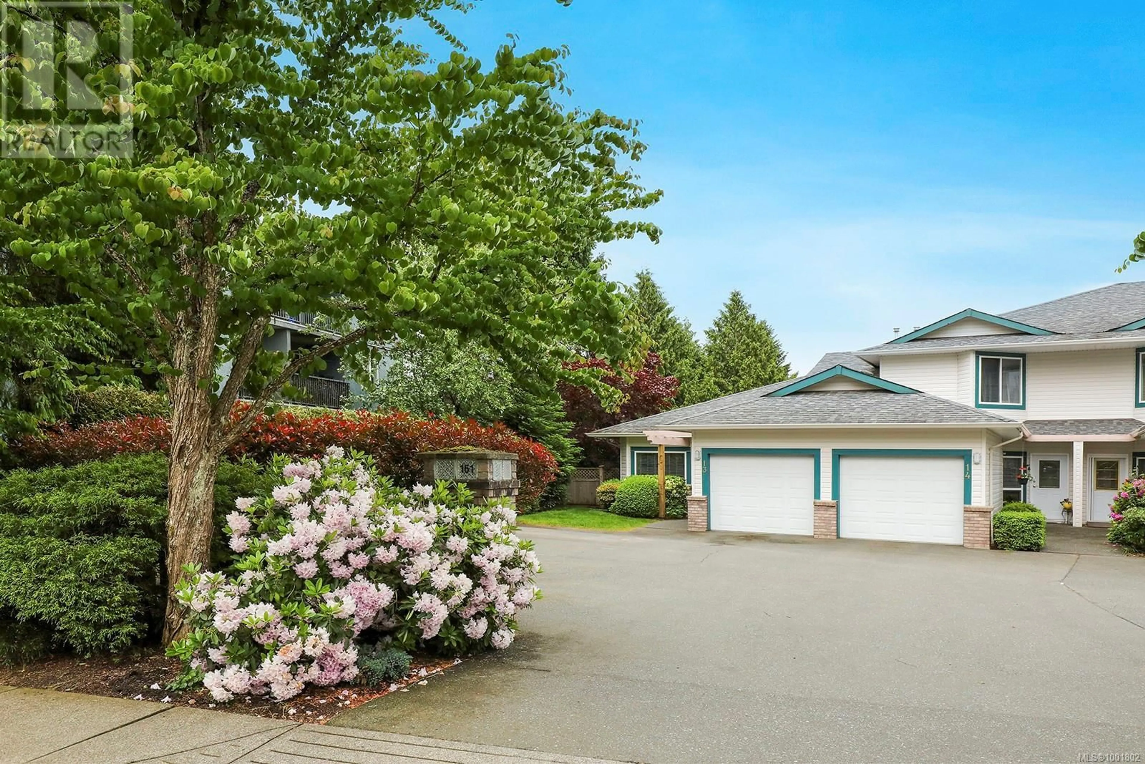 Home with vinyl exterior material, street for 13 - 161 BACK ROAD, Courtenay British Columbia V9N3W5