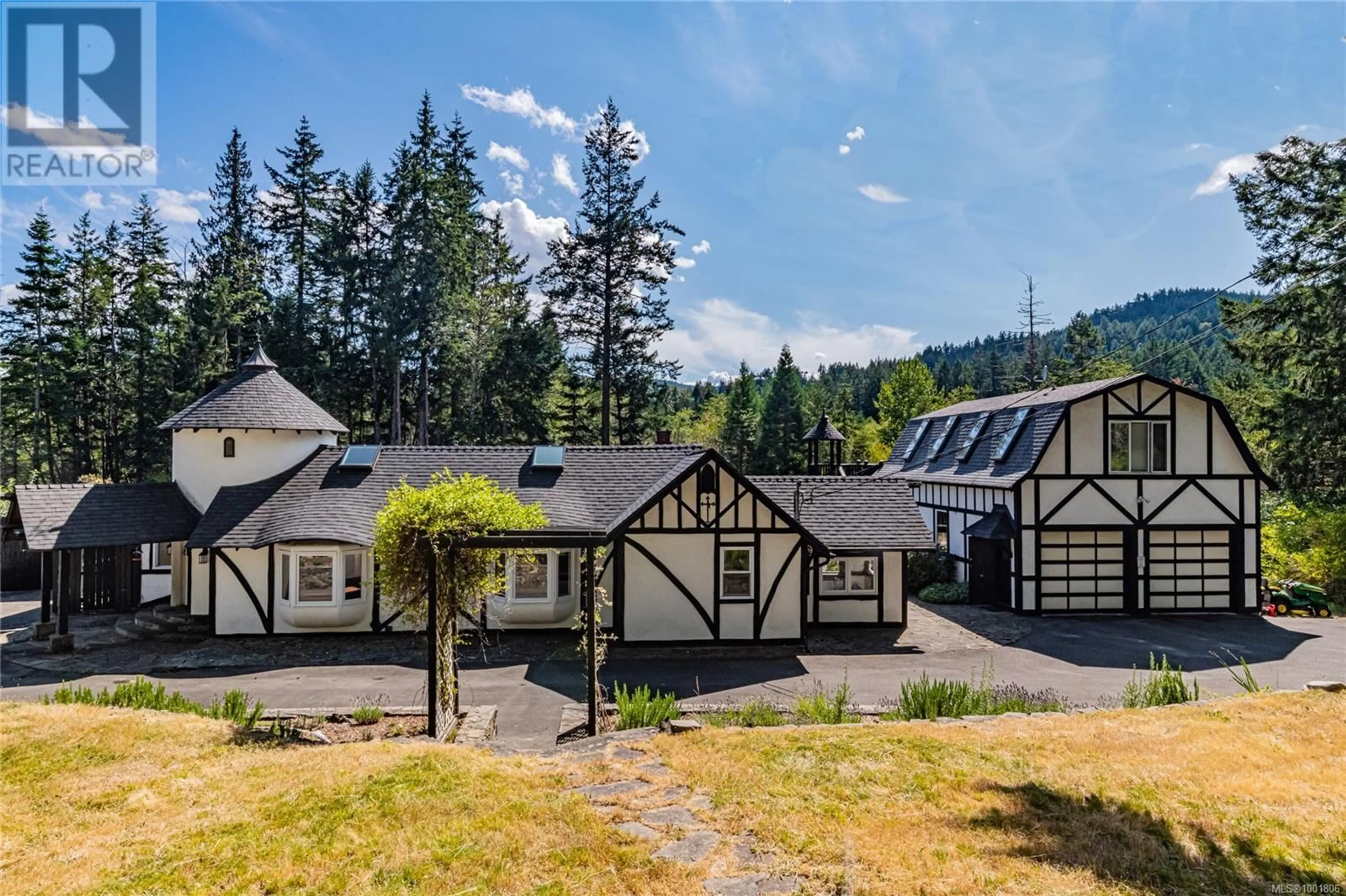 A pic from outside/outdoor area/front of a property/back of a property/a pic from drone, mountain view for 140 KITCHEN ROAD, Salt Spring British Columbia V8K2B3