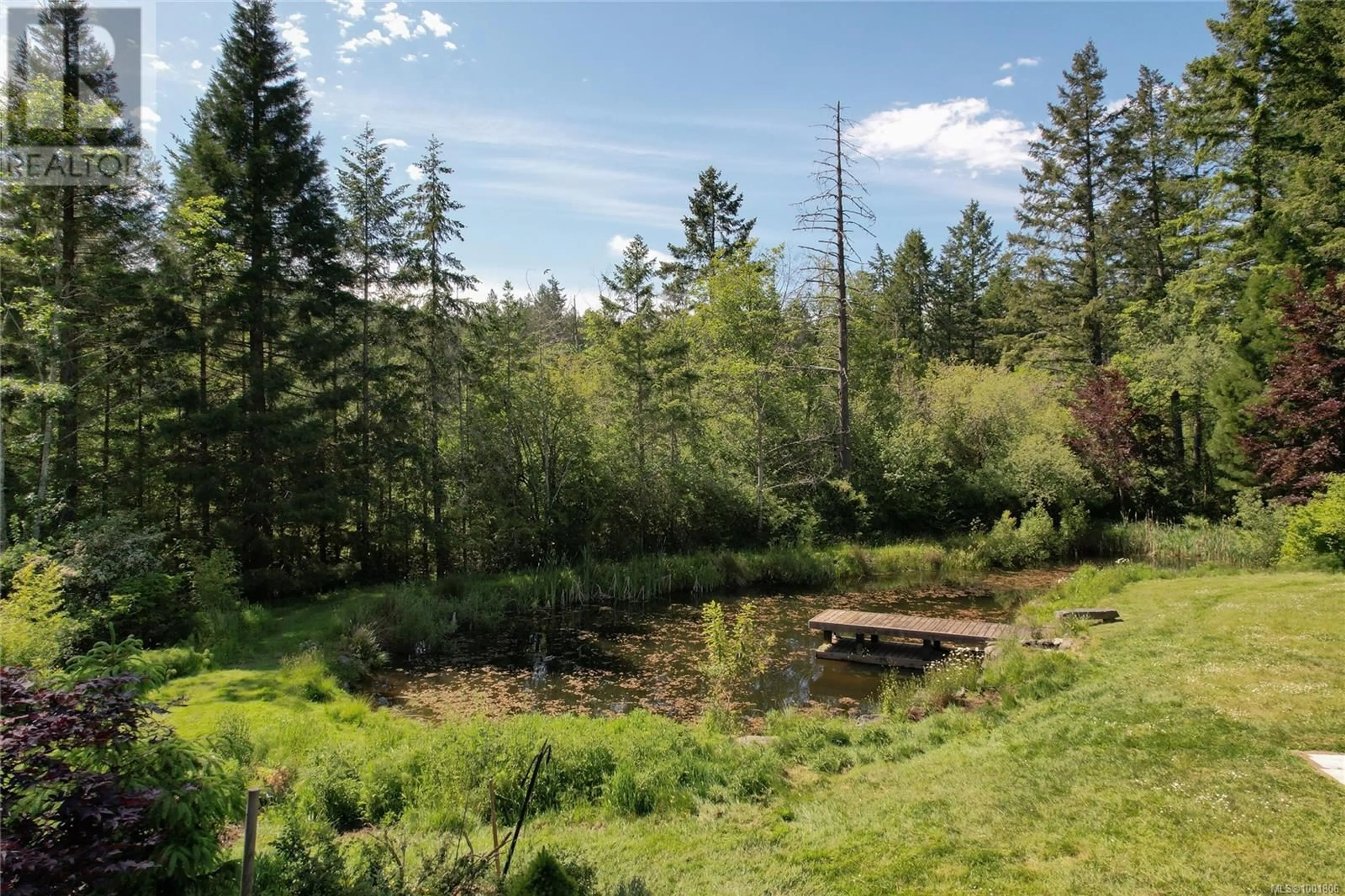 A pic from outside/outdoor area/front of a property/back of a property/a pic from drone, forest/trees view for 140 KITCHEN ROAD, Salt Spring British Columbia V8K2B3