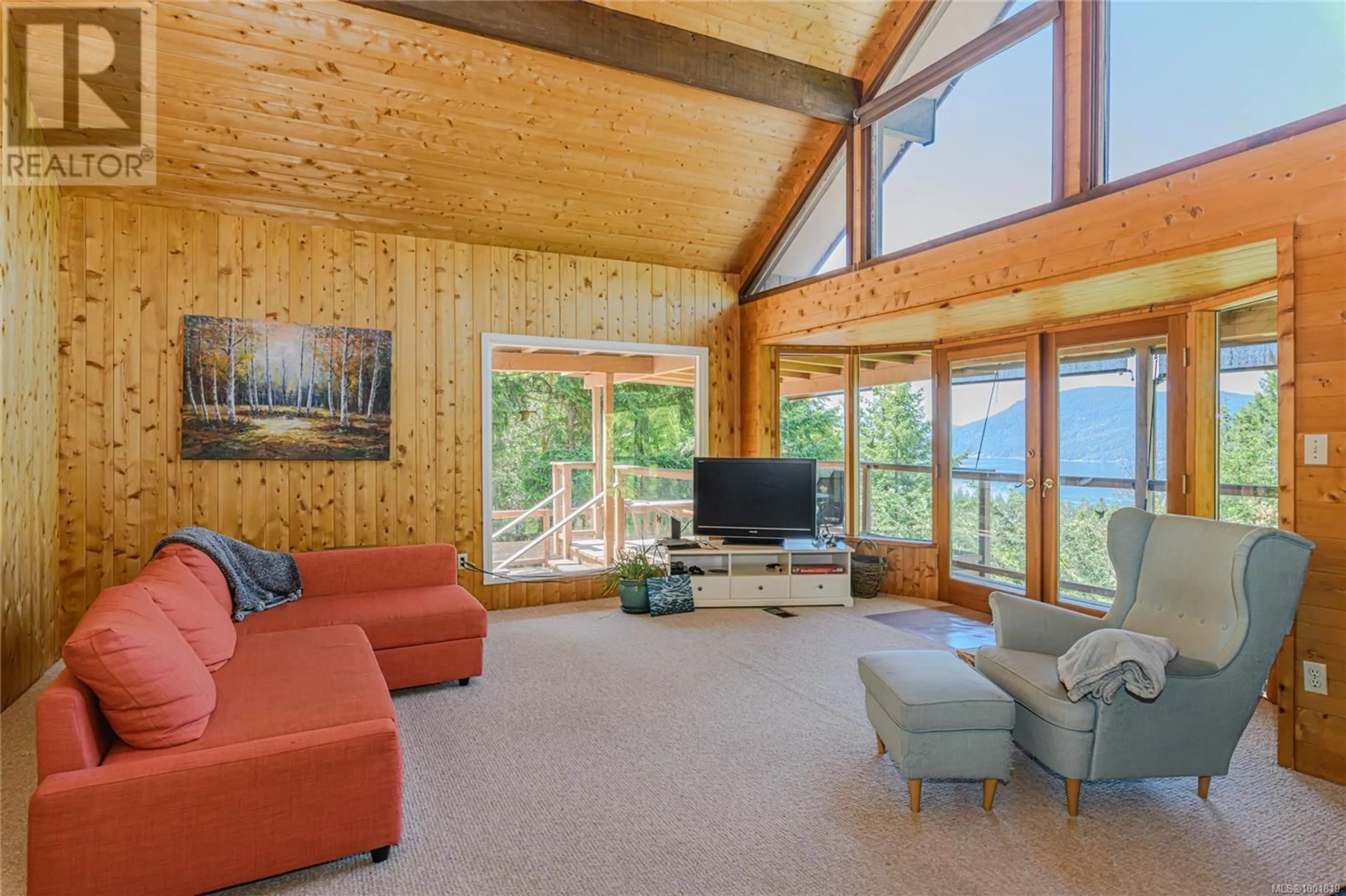 Living room with furniture, wood/laminate floor for 119 AGAR ROAD, Salt Spring British Columbia V8K1J7