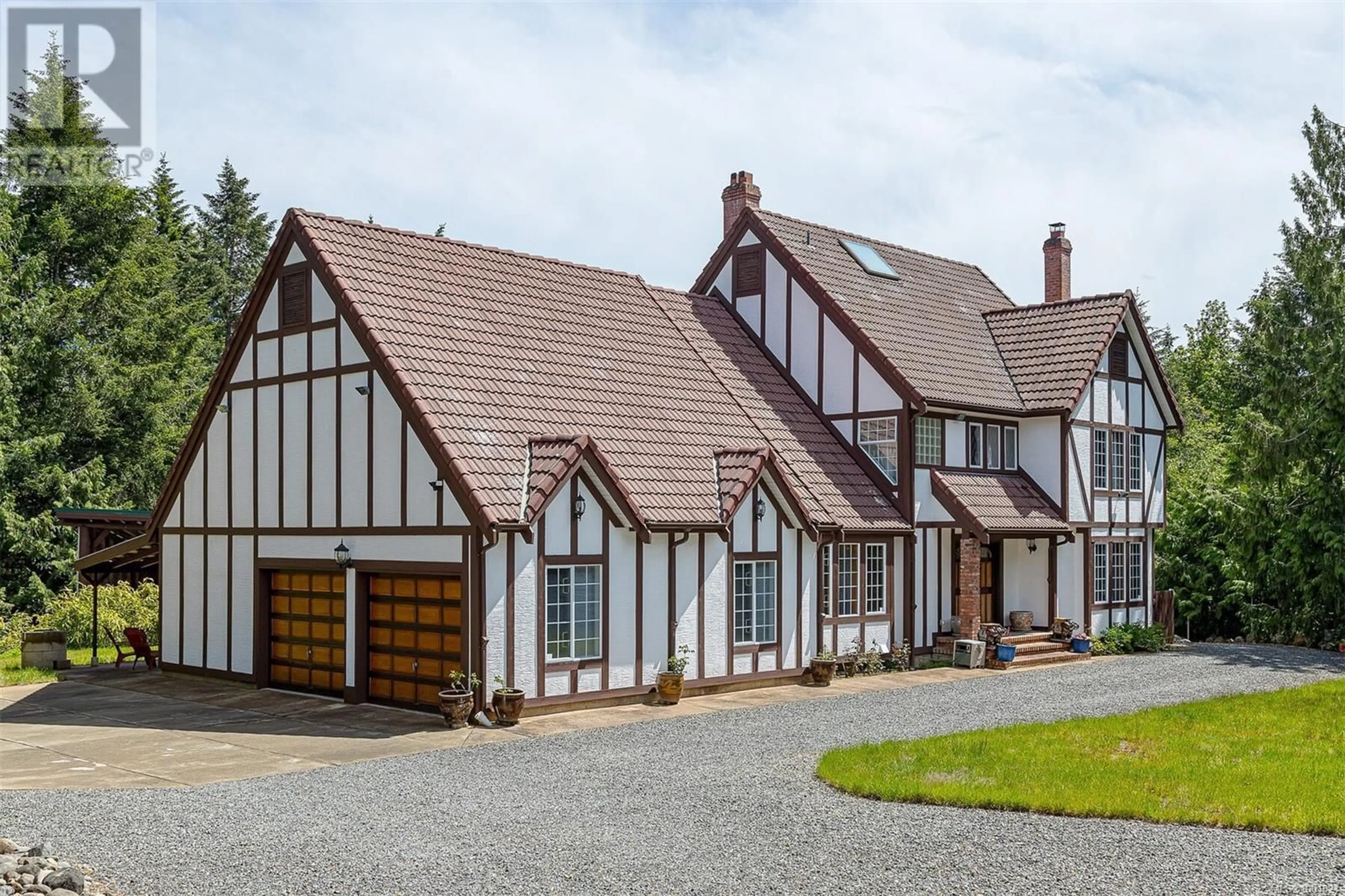 A pic from outside/outdoor area/front of a property/back of a property/a pic from drone, street for 1307 SYLVIA PLACE, Shawnigan Lake British Columbia V0R1L6
