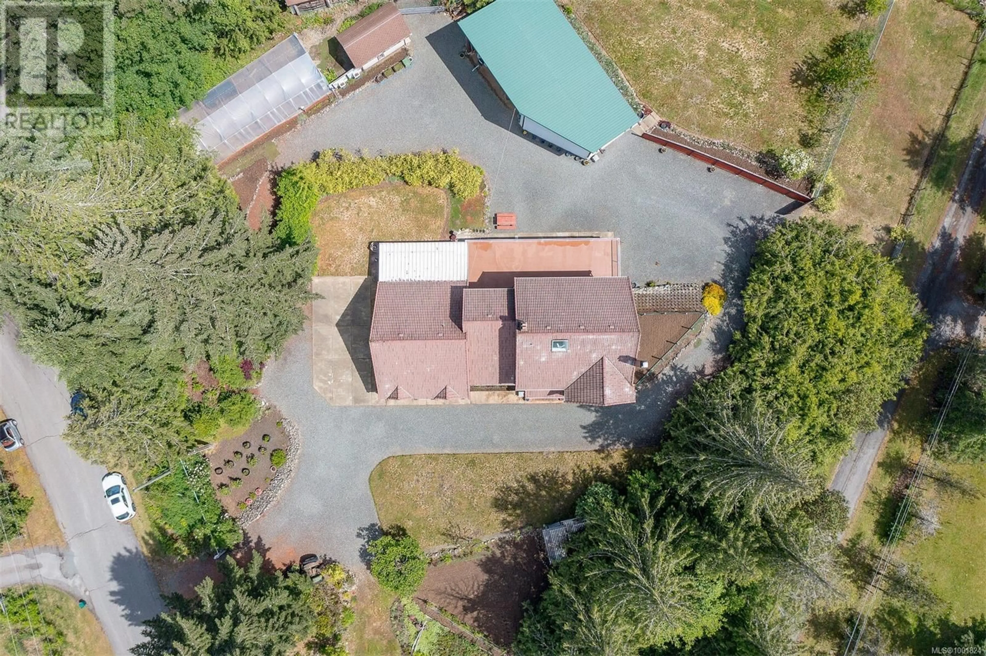 A pic from outside/outdoor area/front of a property/back of a property/a pic from drone, unknown for 1307 SYLVIA PLACE, Shawnigan Lake British Columbia V0R1L6