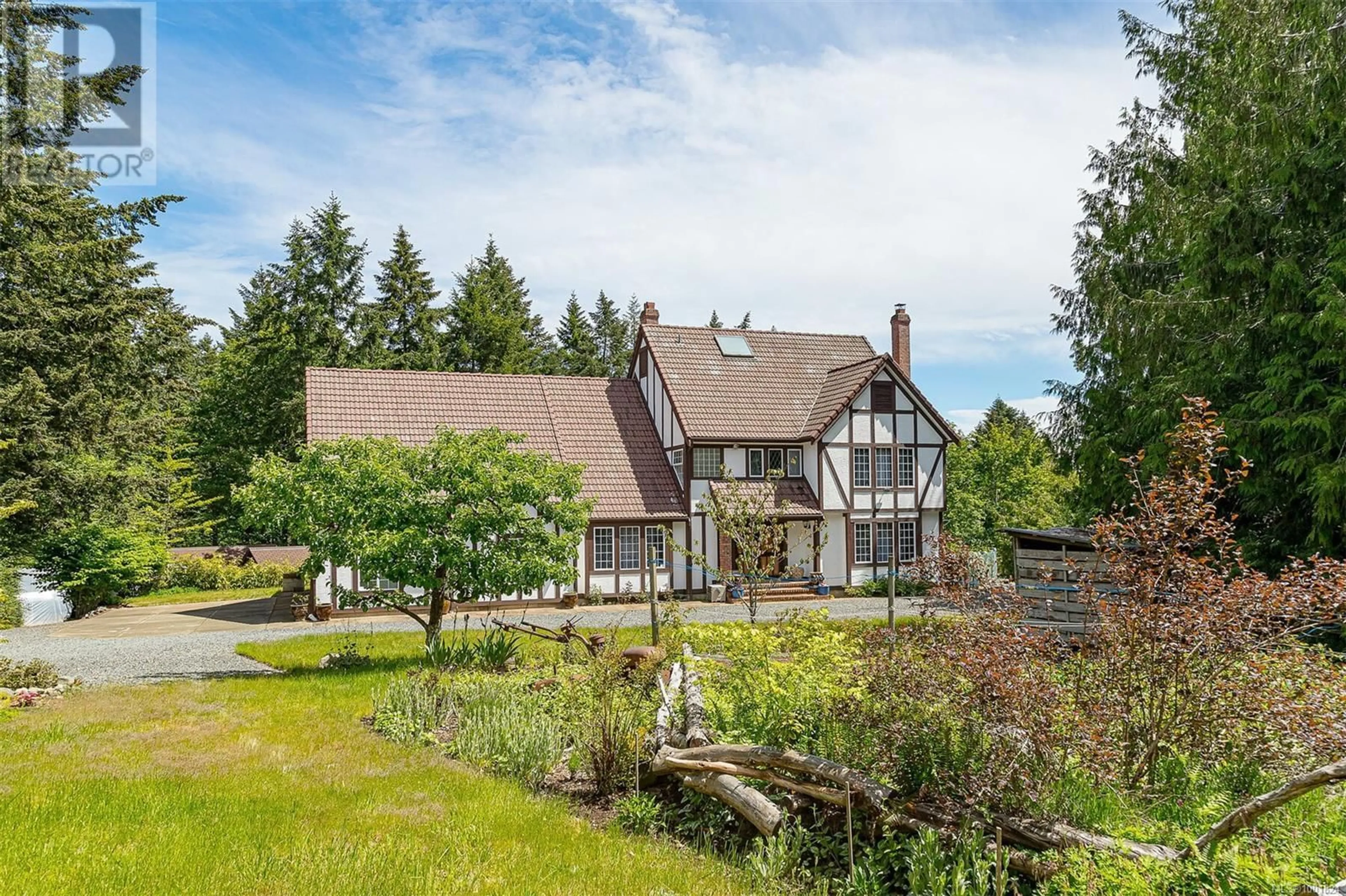 A pic from outside/outdoor area/front of a property/back of a property/a pic from drone, unknown for 1307 SYLVIA PLACE, Shawnigan Lake British Columbia V0R1L6