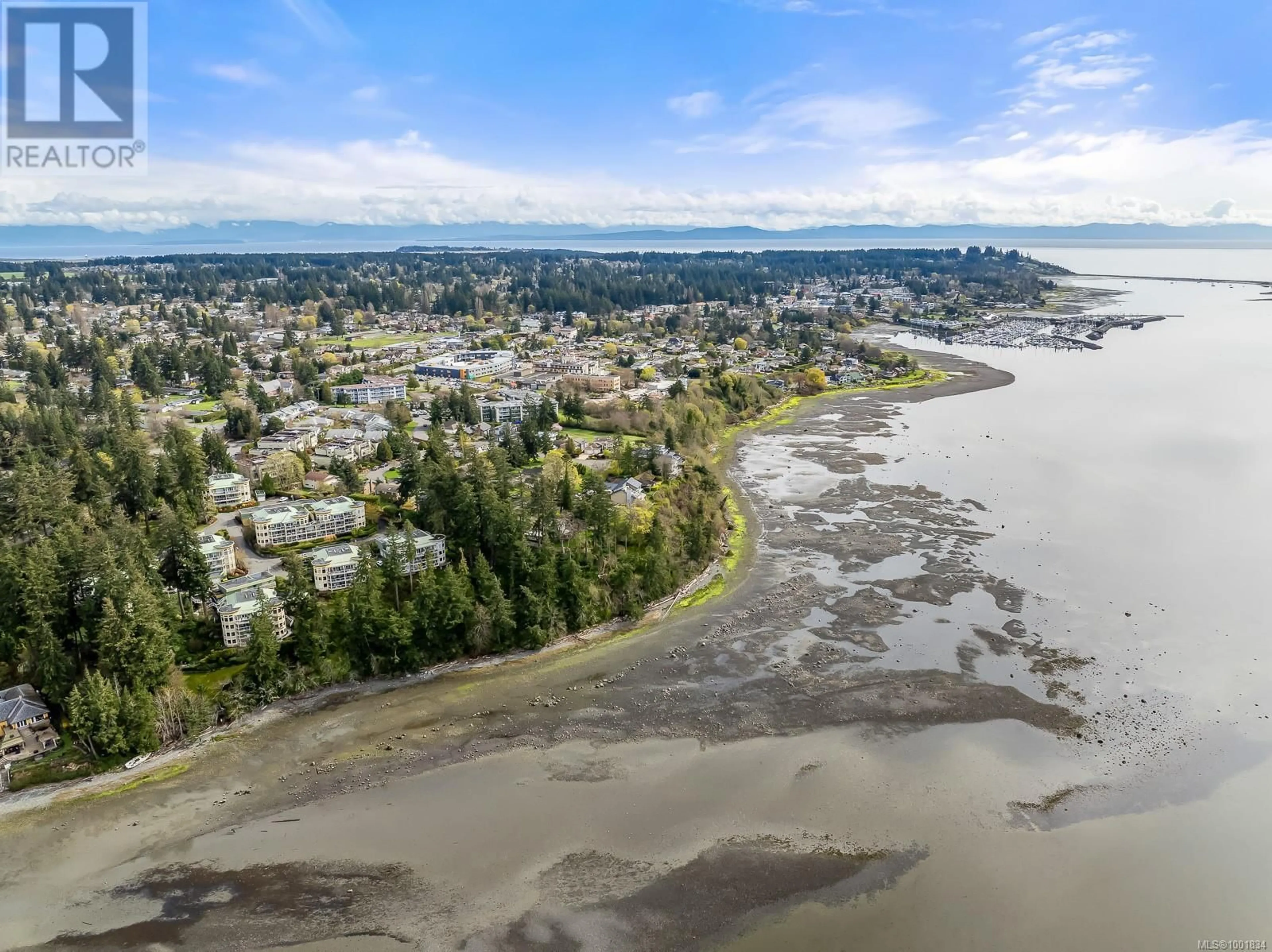 A pic from outside/outdoor area/front of a property/back of a property/a pic from drone, water/lake/river/ocean view for 309C - 2250 MANOR PLACE, Comox British Columbia V9M1C5