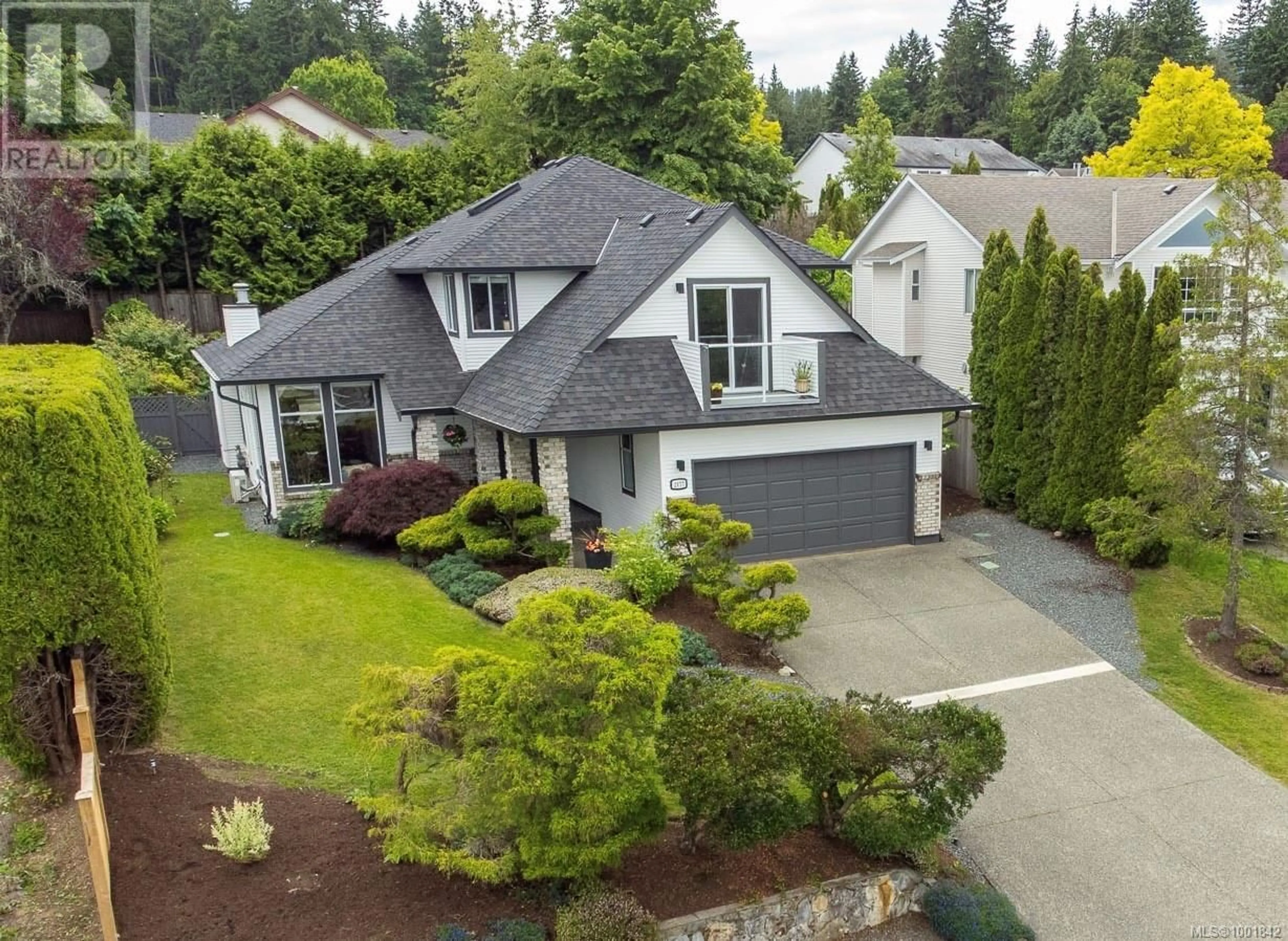 A pic from outside/outdoor area/front of a property/back of a property/a pic from drone, street for 2177 WOODTHRUSH PLACE, Nanaimo British Columbia V9R6V2